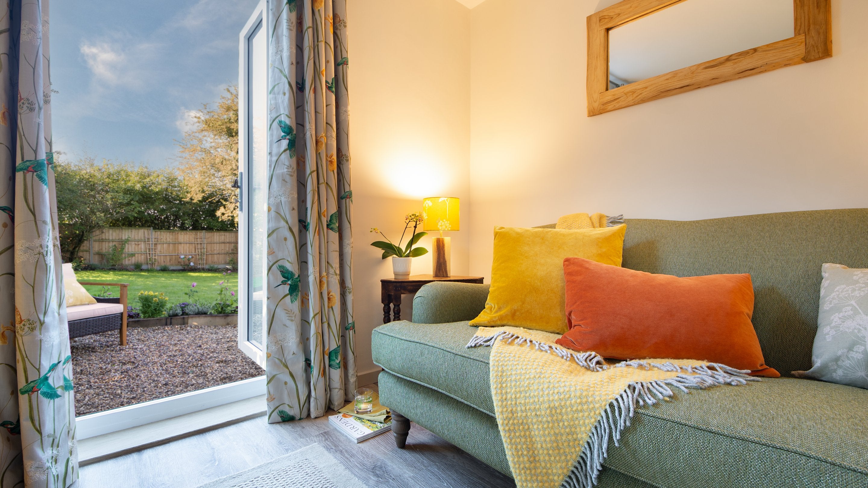 The glass doors from the sitting room to the back garden at Cladium, Cambridgeshire