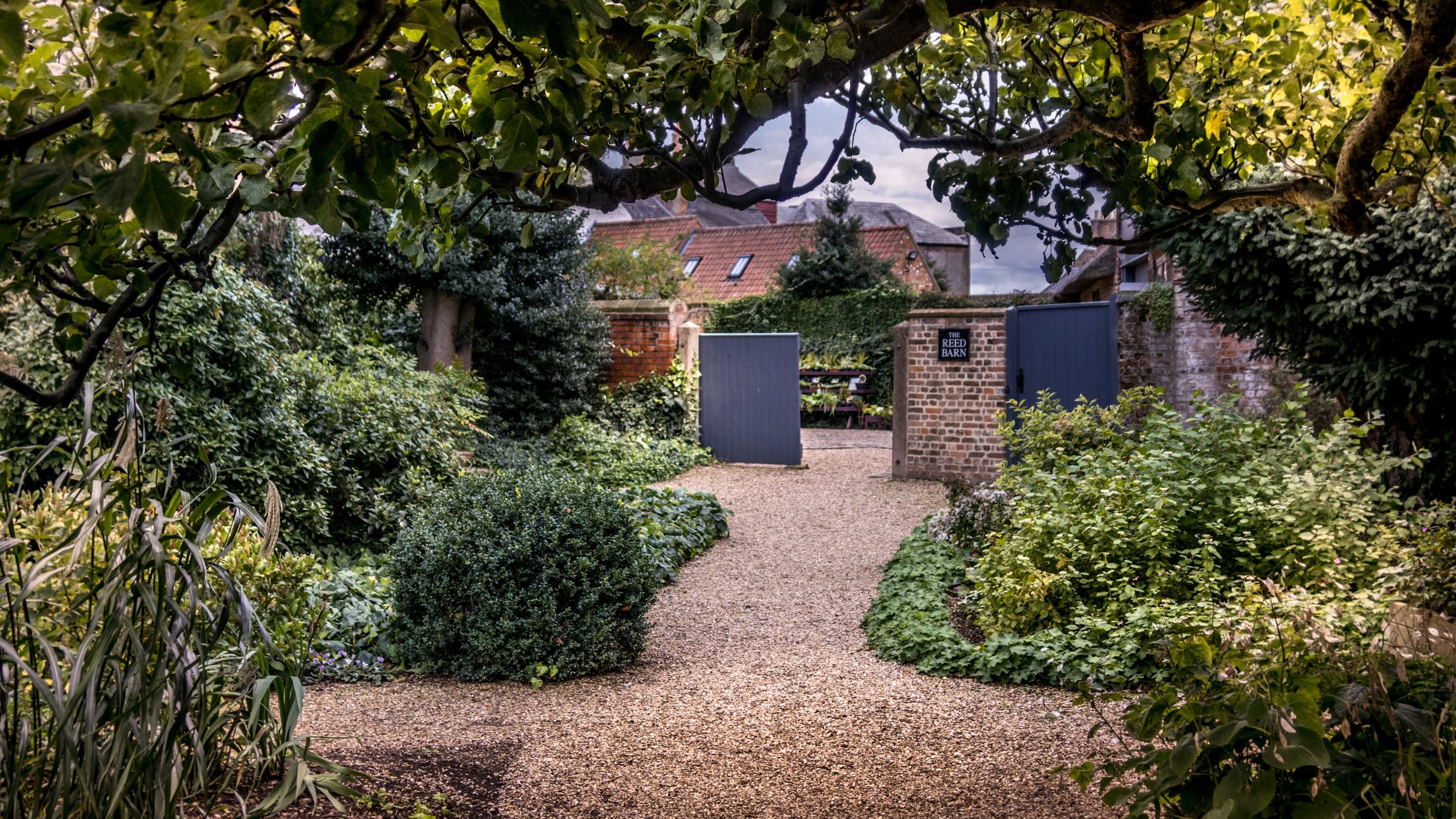 The Reed Barn restaurant and plant sales in the courtyard at Peckover House and Garden, Cambridgeshire