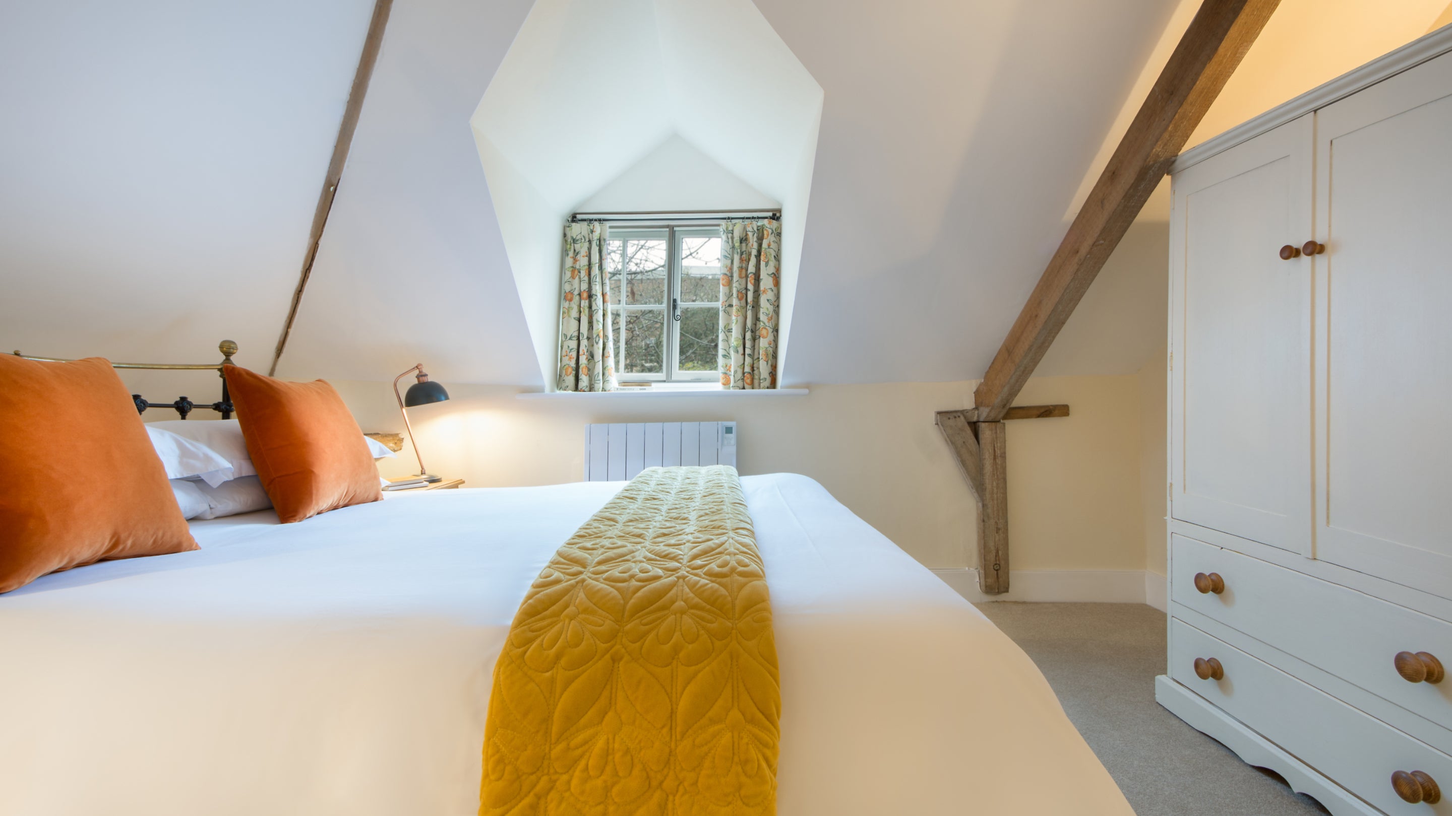 The open-plan bedroom and sitting area at Peckover Stable Lodge, Cambridgeshire