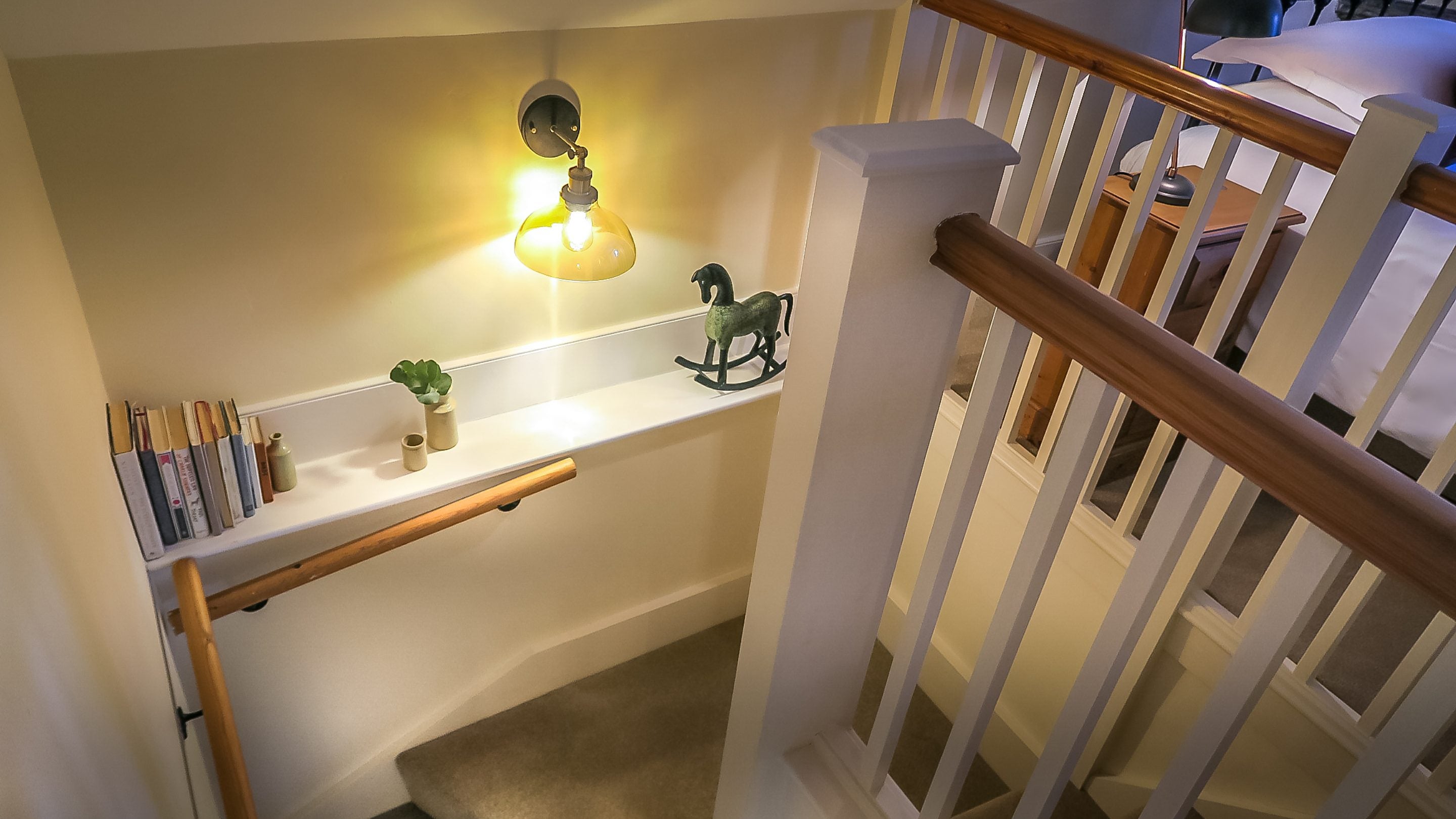 The stairs leading up to the bedroom and sitting area at Peckover Stable Lodge, Cambridgeshire