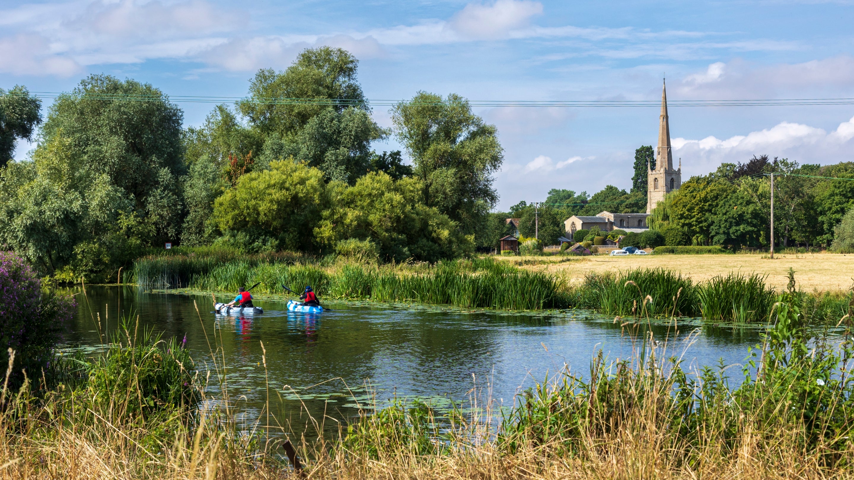 Guests enjoying the waterways near Waterclose Meadows Campsite, Cambridgeshire