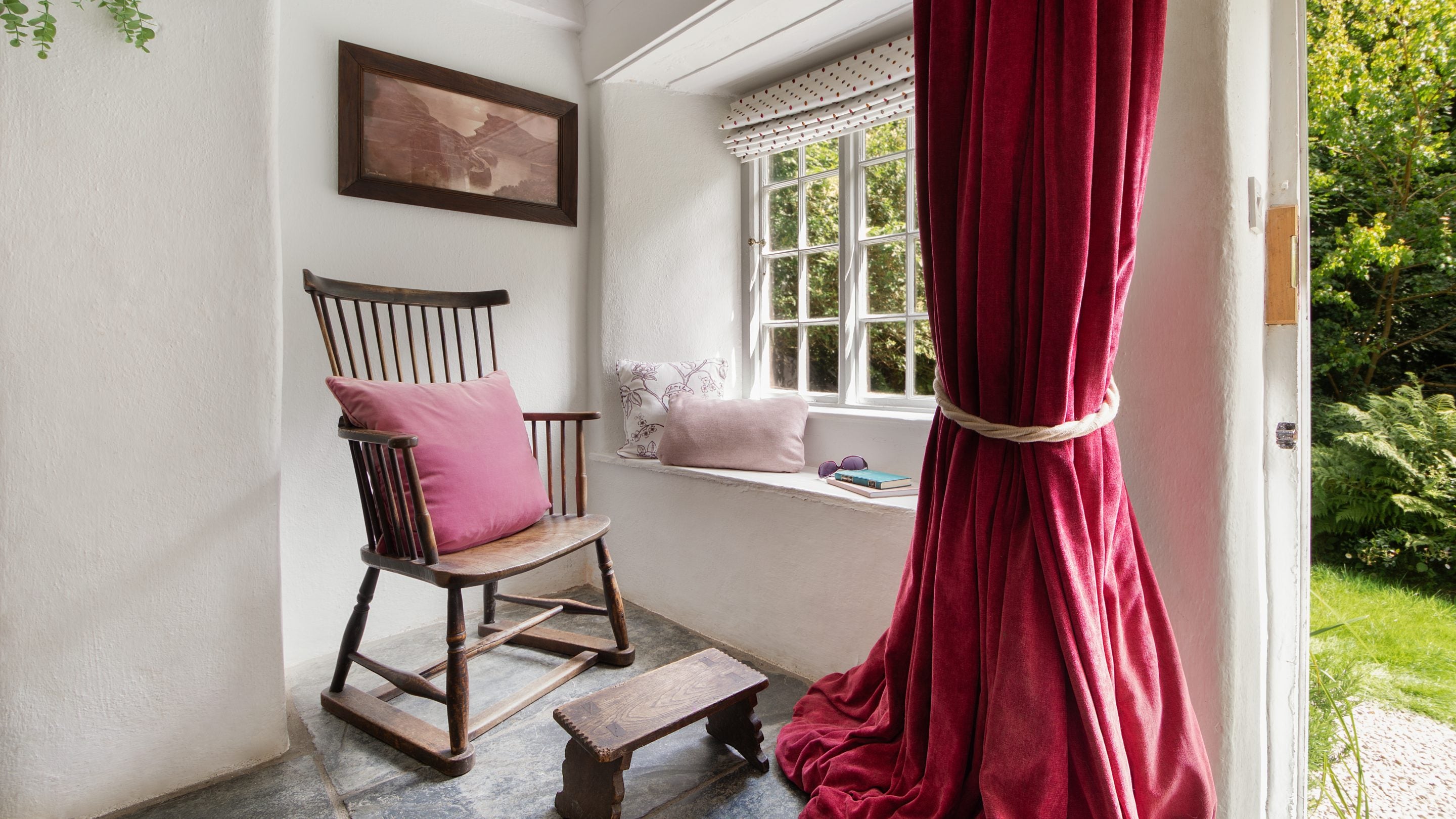 The reading nook in the dining hall at Boscastle Elm Cottage, Cornwall