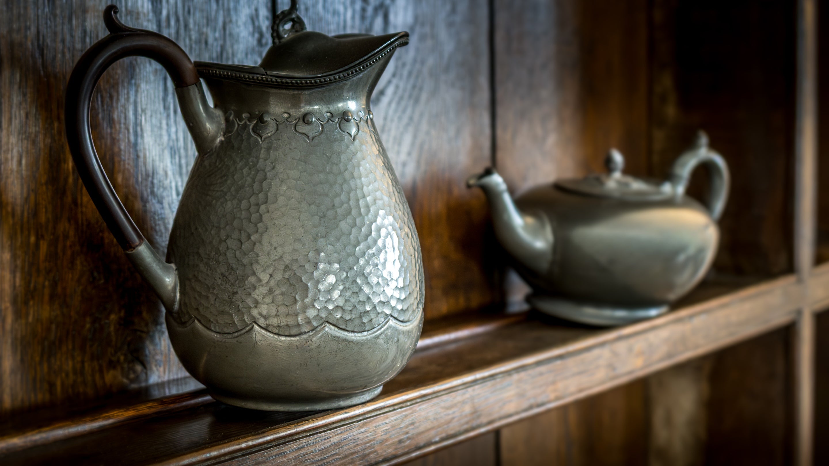 Ornamental teapot and jug on a shelf in the dining area of Carnweather, Cornwall