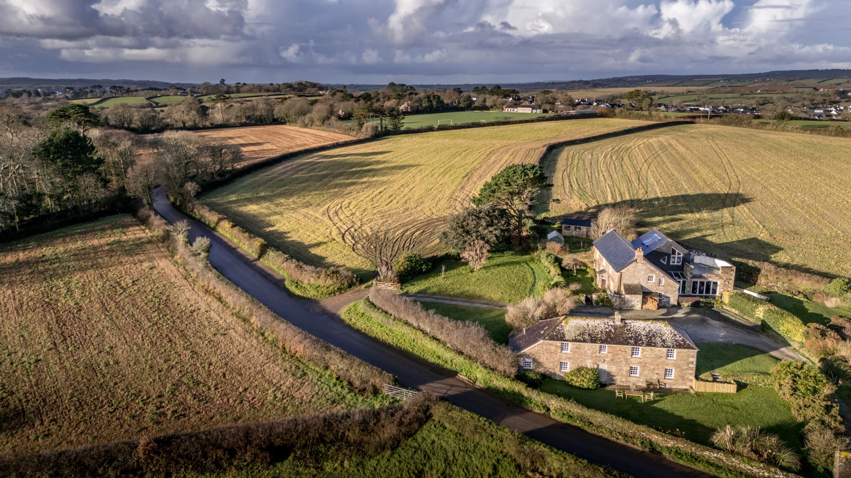 An aerial view Chenhalls Barn and the surrounding fields, Cornwall