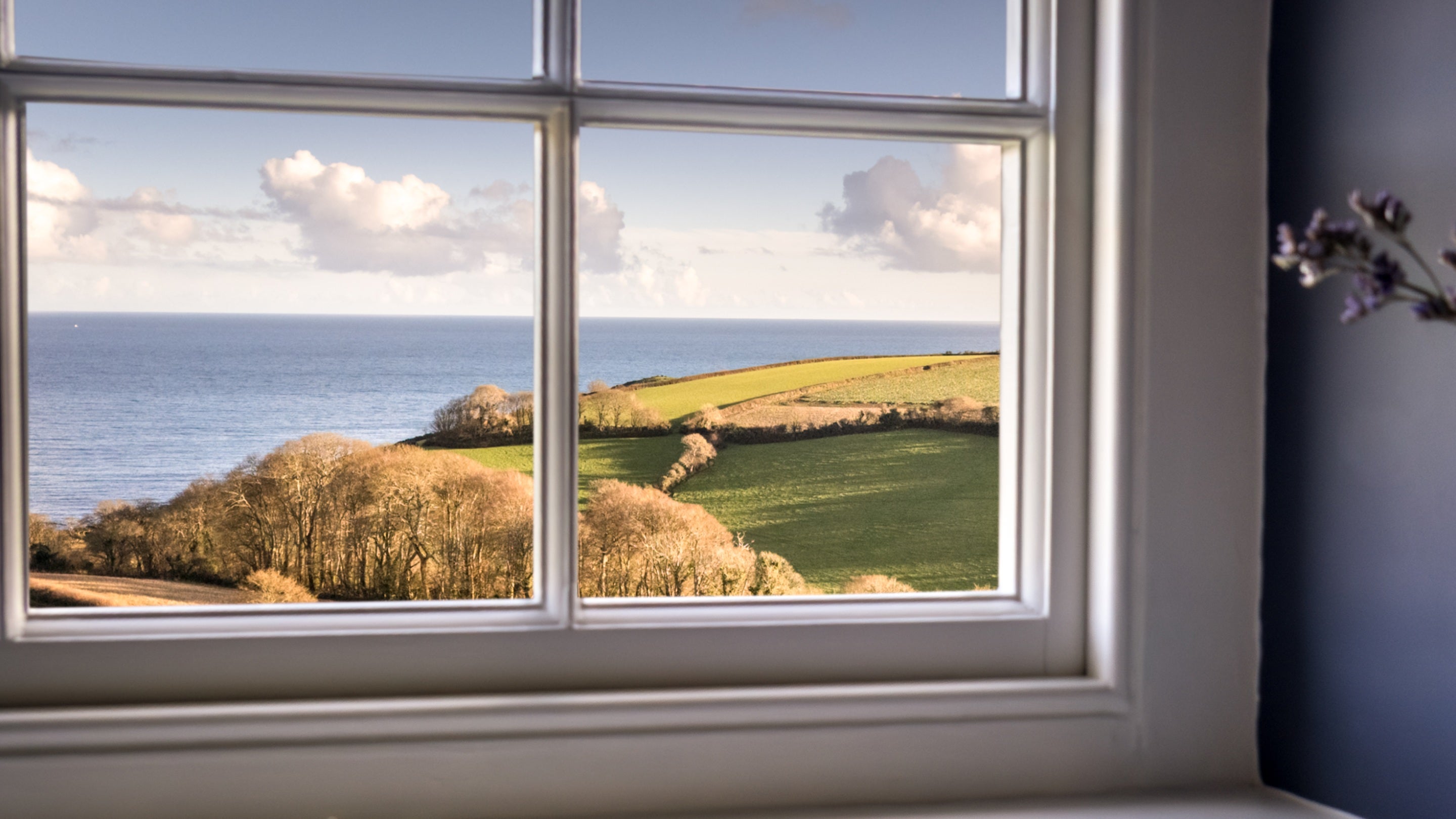 The sea view from a window in the kitchen at Chenhalls Barn, Cornwall