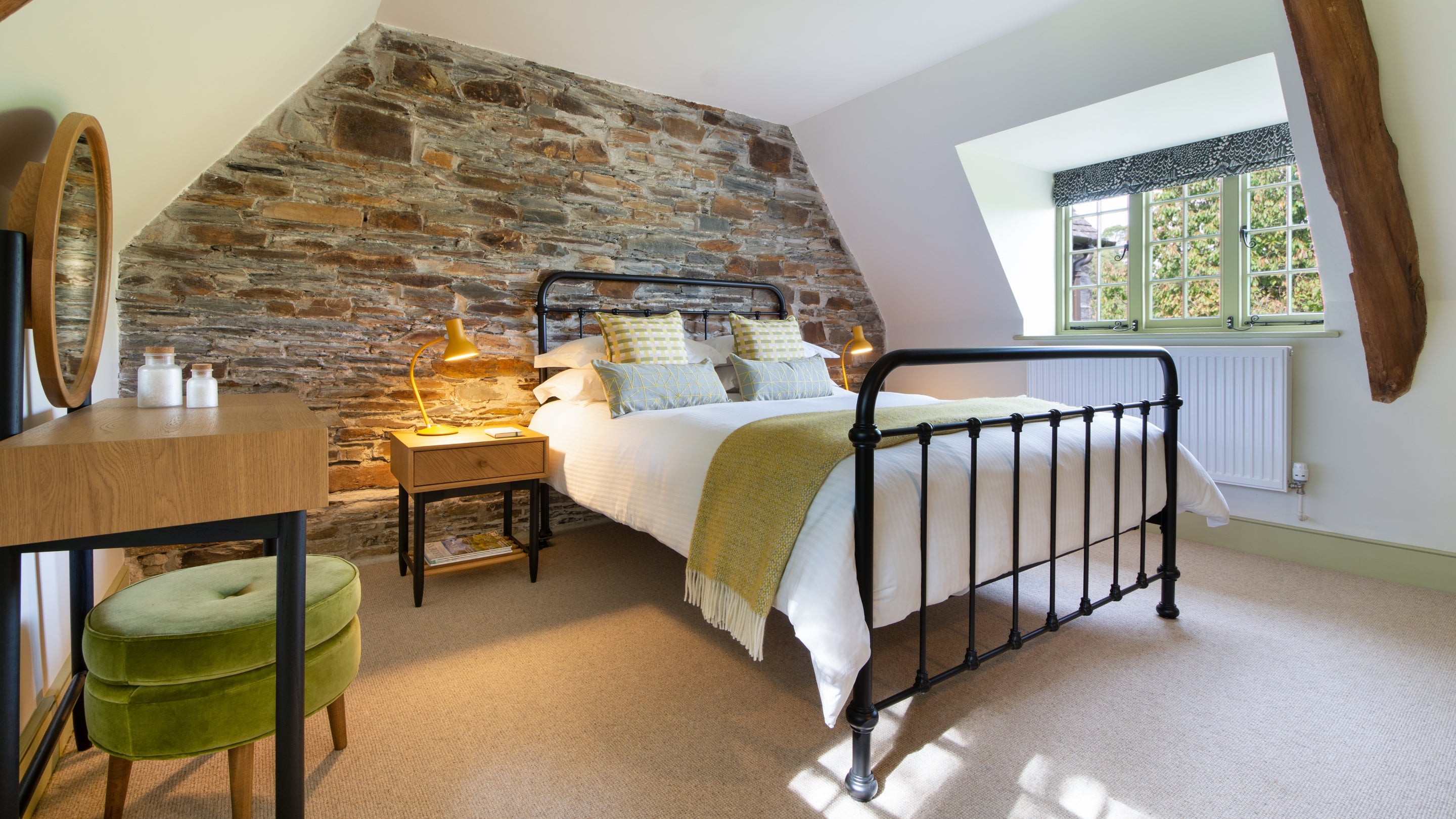 The mezzanine bedroom at Cotehele Dairy Cottage, Cornwall