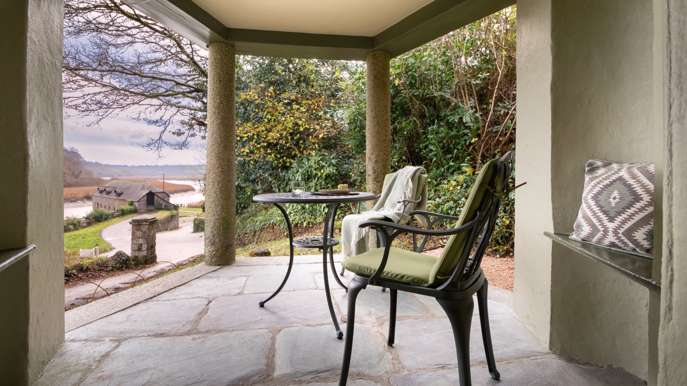 The portico with a table for two and view of the Tamar River, Cornwall