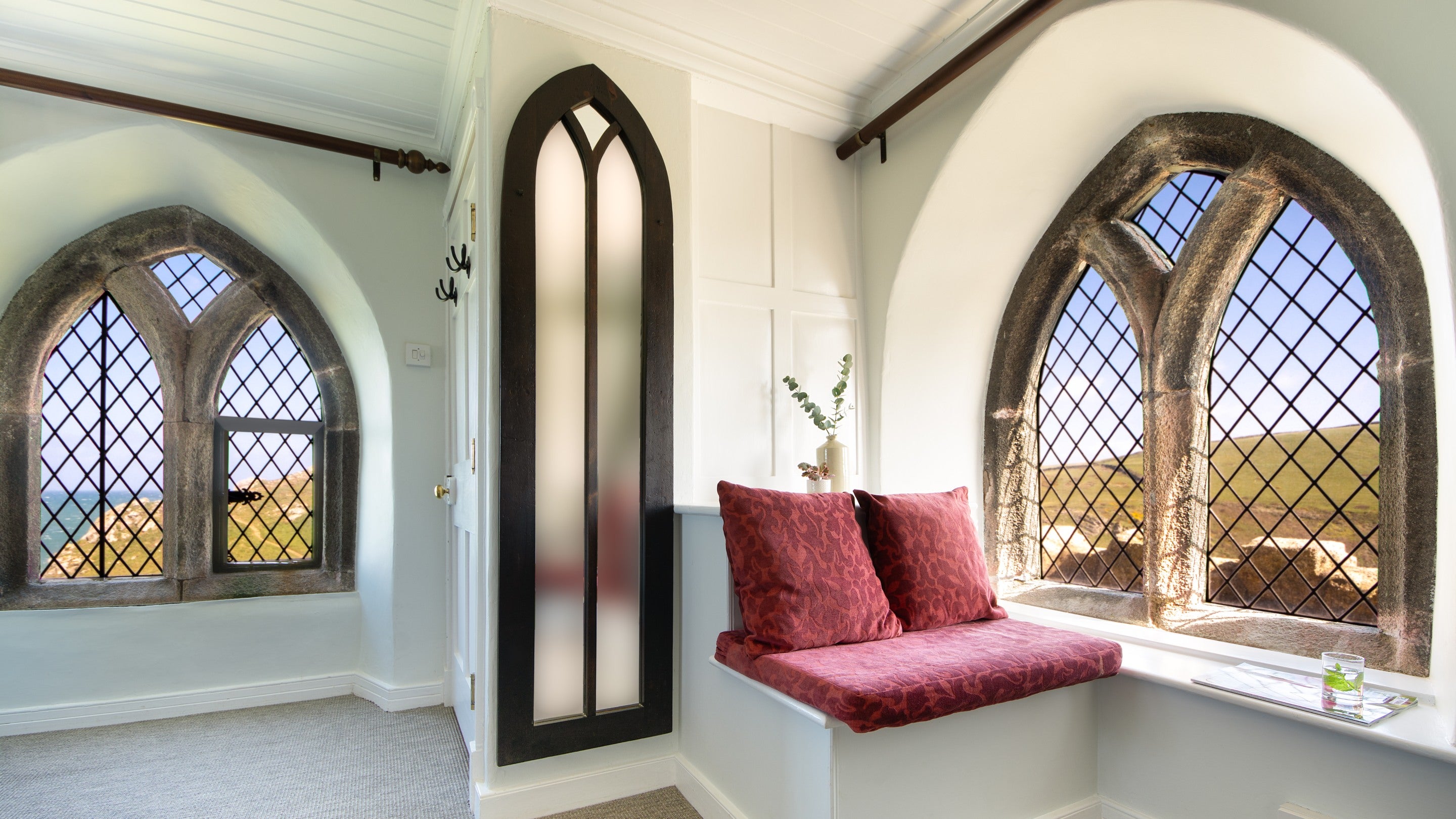 The bench seating in the bedroom at Doyden Castle, Cornwall