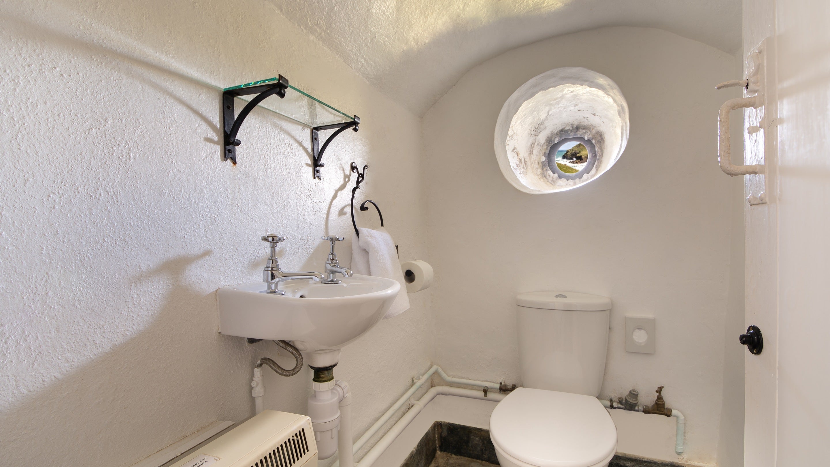 The separate toilet at Doyden Castle, Cornwall
