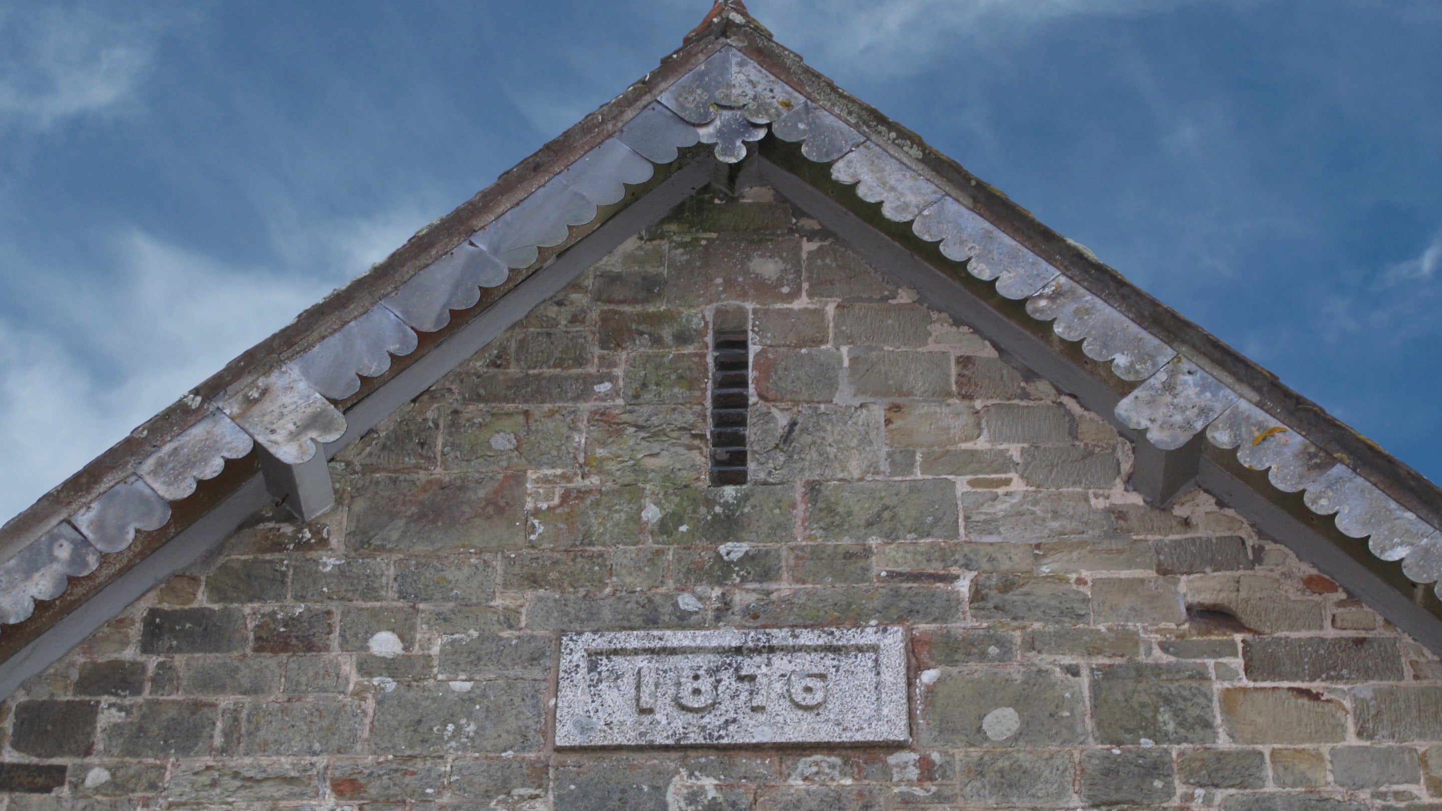 The date stone of Durgan Old School House, Cornwall