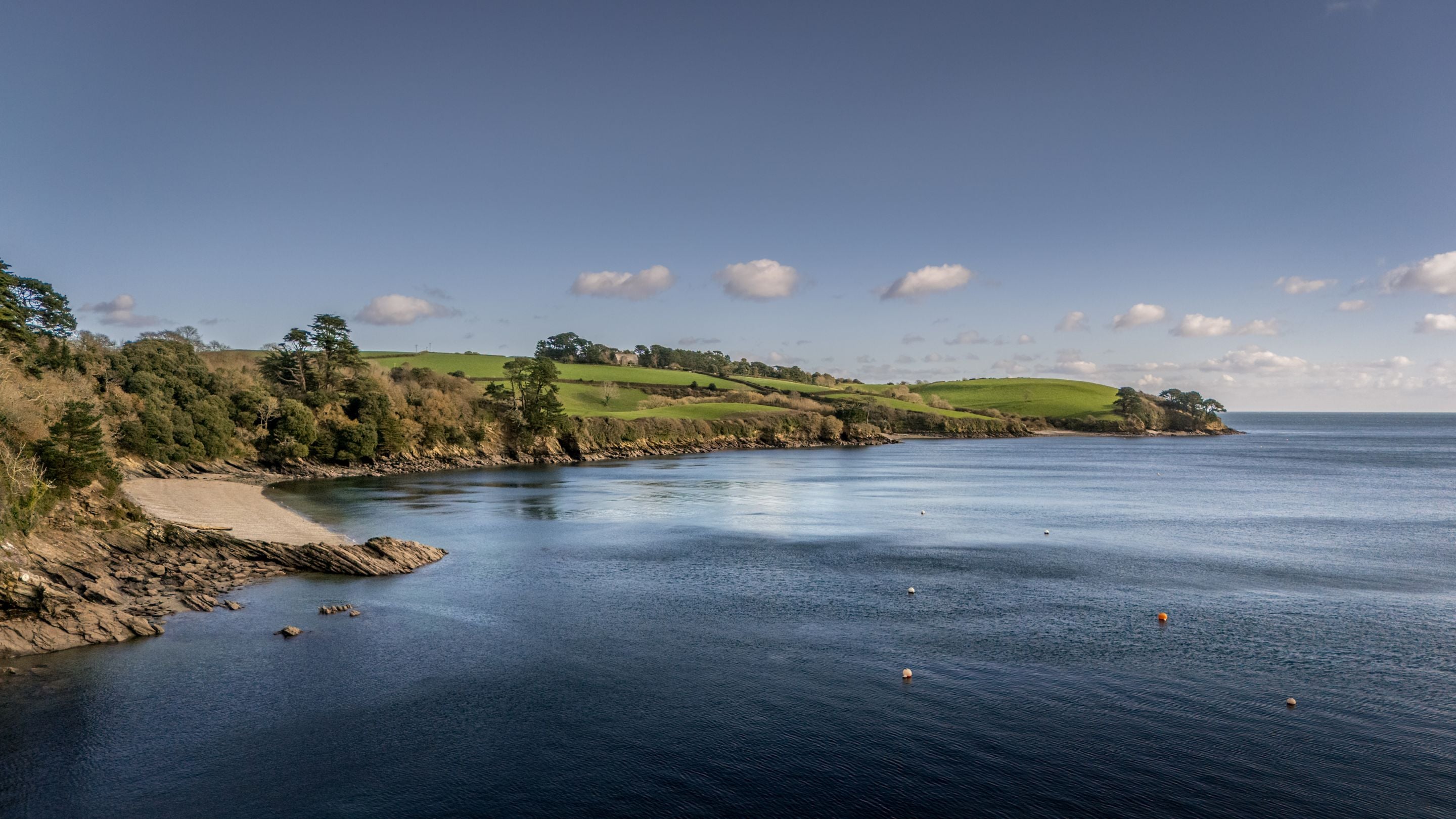 An aerial view of Grebe Beach, just a few minutes along the coast from the holiday cottages at Durgan, Cornwall