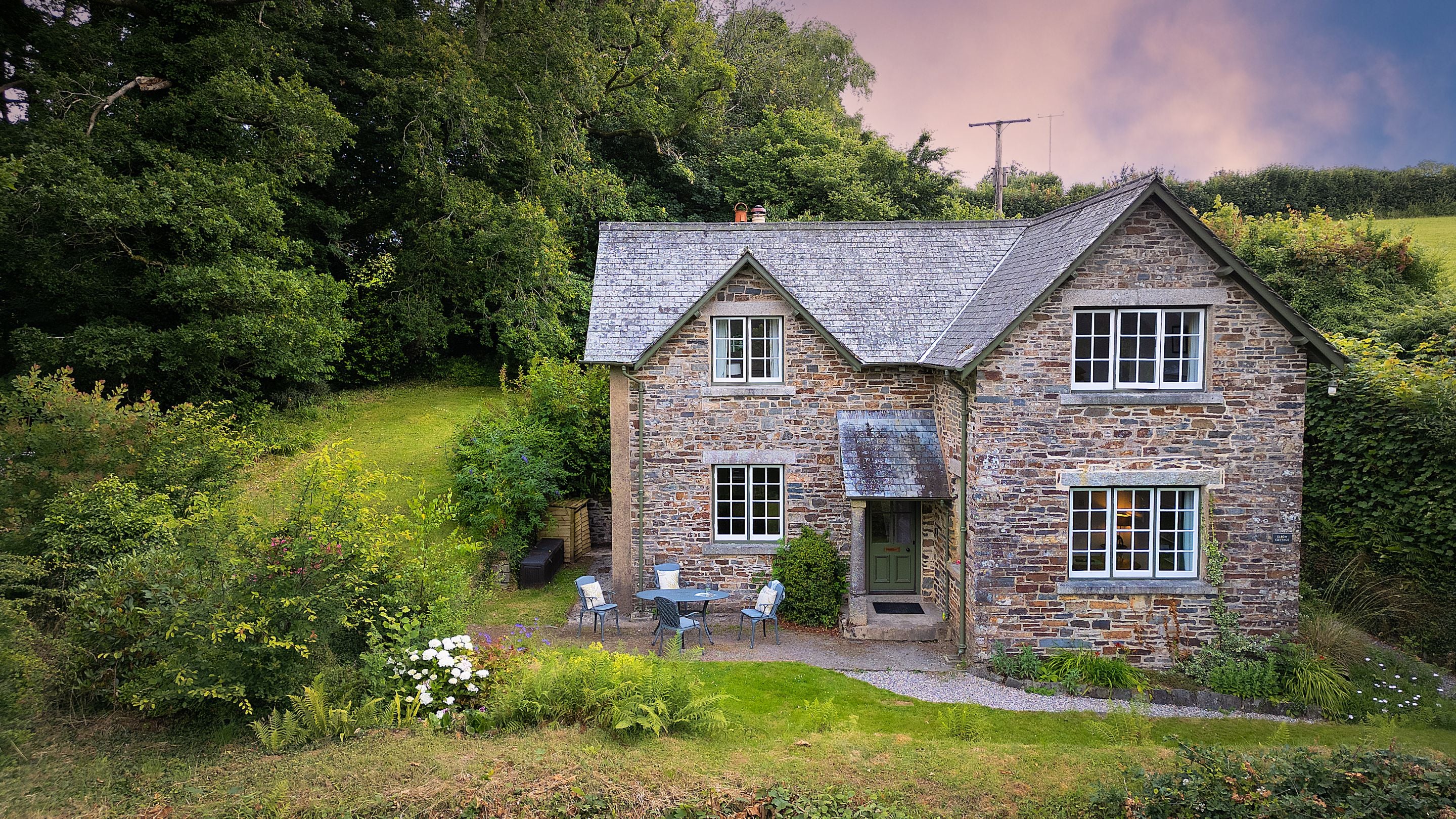 An aerial view of Elbow Cottage and its garden, Cornwall
