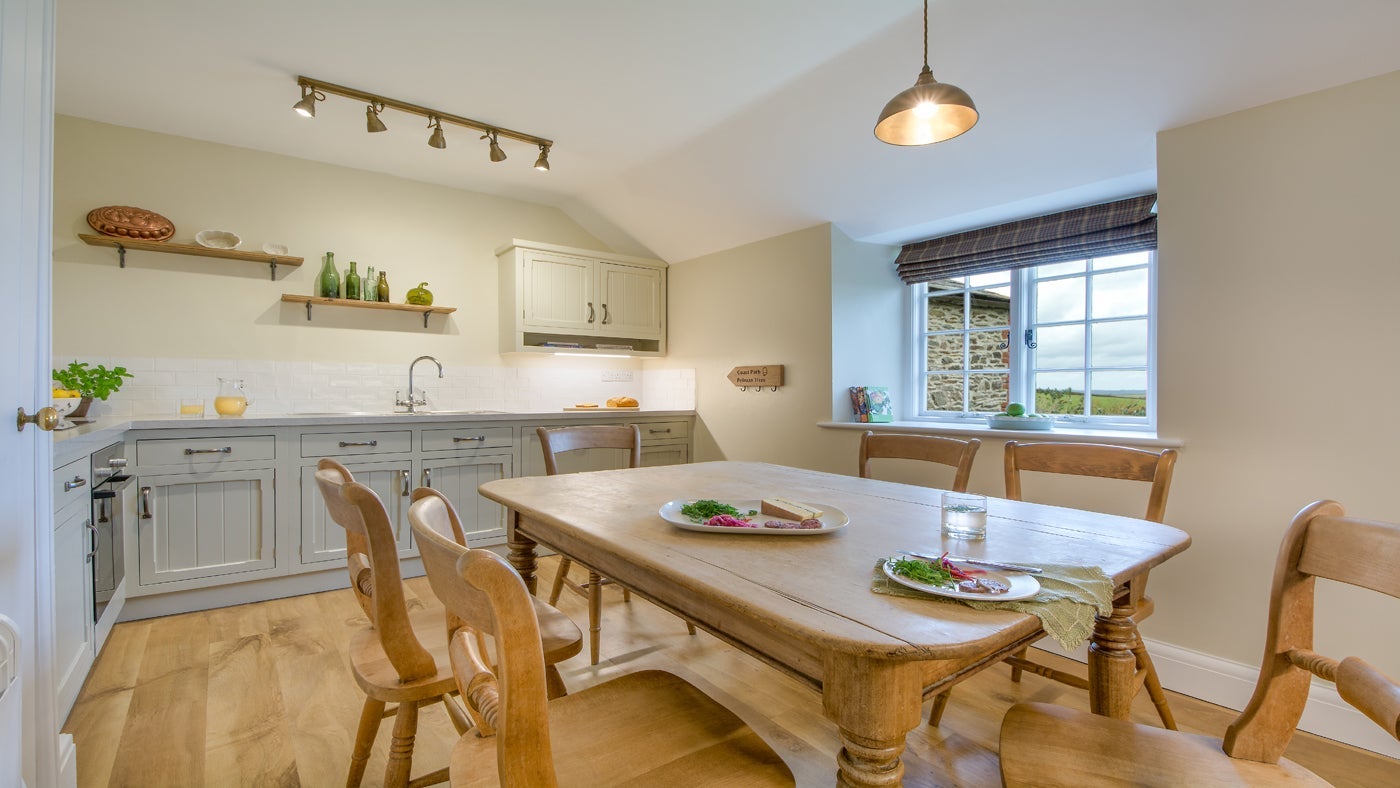 The dining and kitchen area at Fortescue, Lanteglos-by-Fowey, Cornwall 