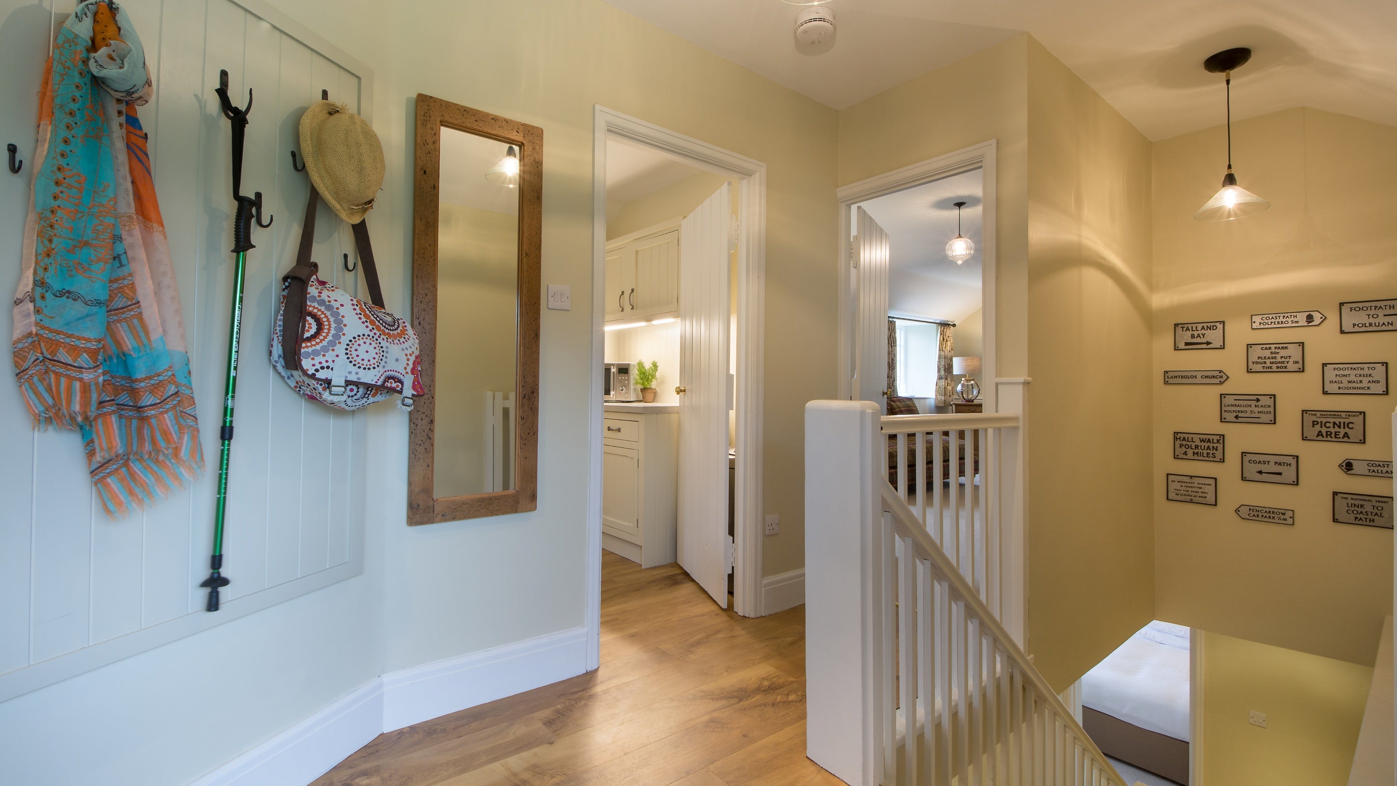 The entrance hallway with hooks to hang coats and bags at Fortescue, Cornwall