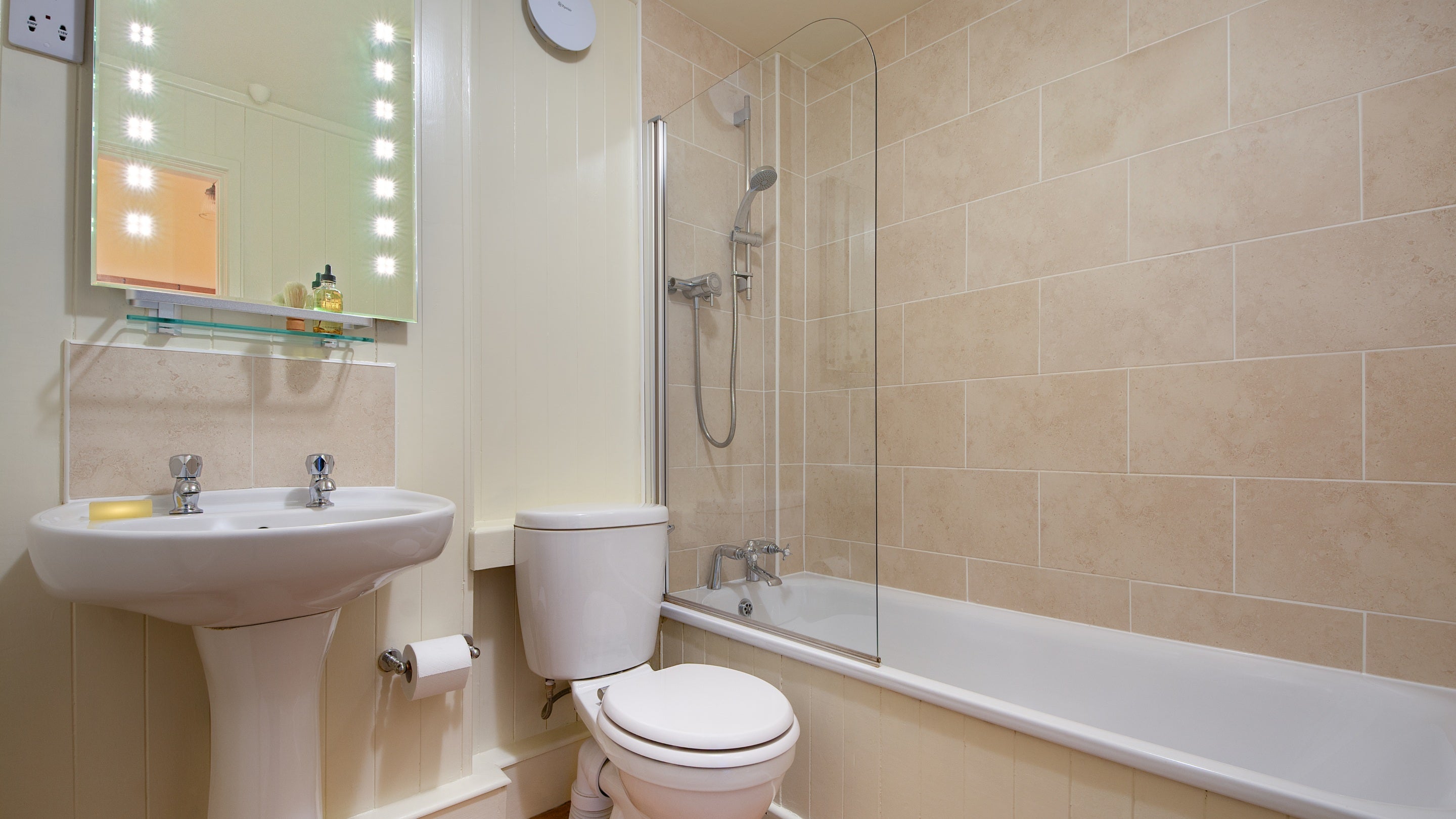The bathroom, with shower over bath, at The Gaffer, Cornwall
