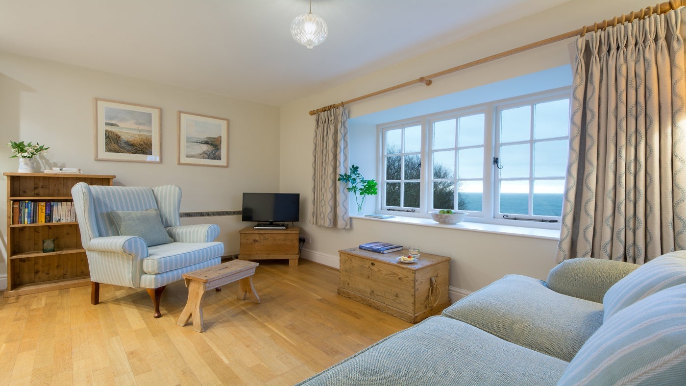The sitting area with coastal views at Gwendra Dairy Cottage, Cornwall