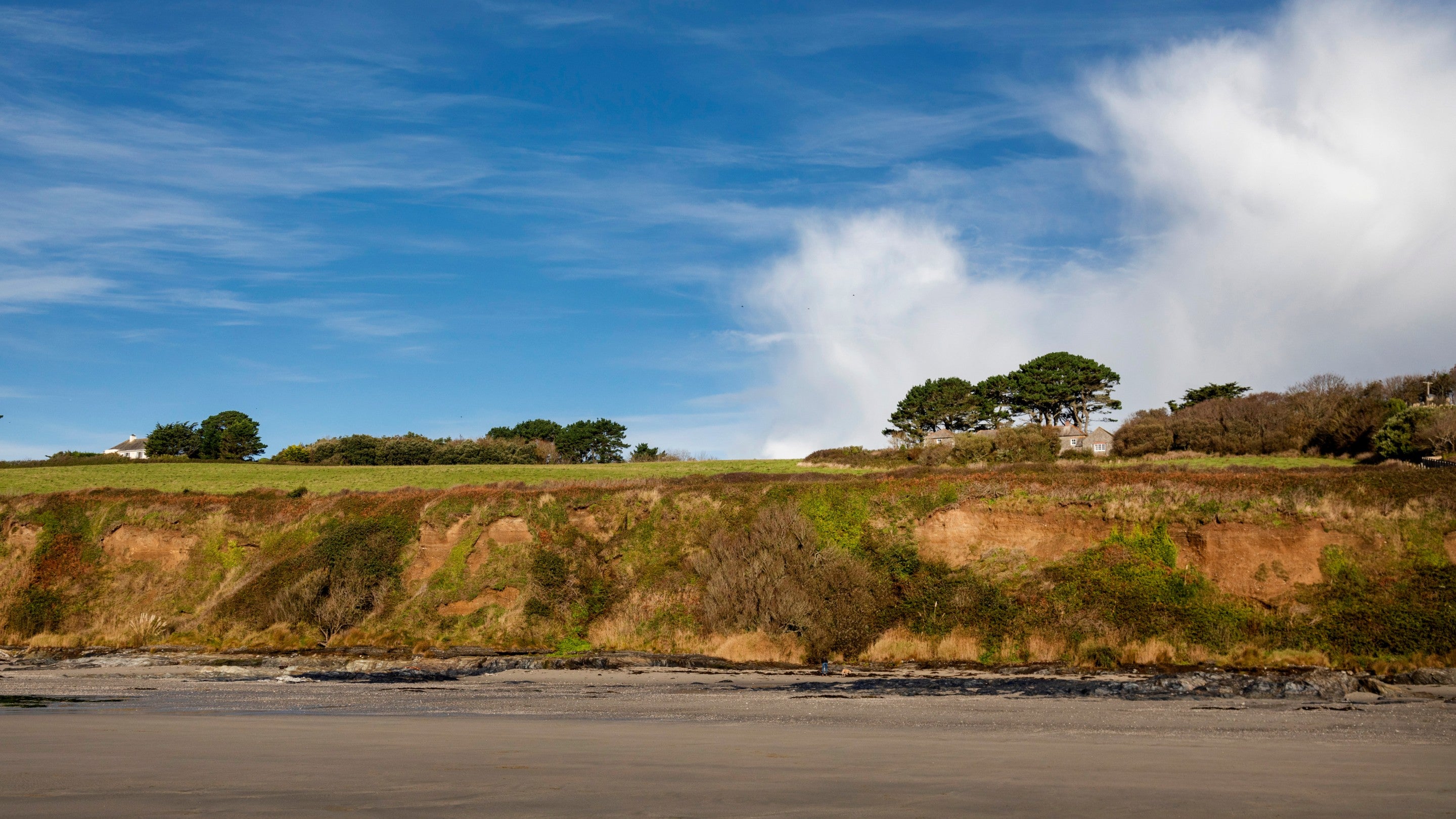 The view from Carne Beach towards Gwendra Wartha and other nearby holiday cottages, Cornwall