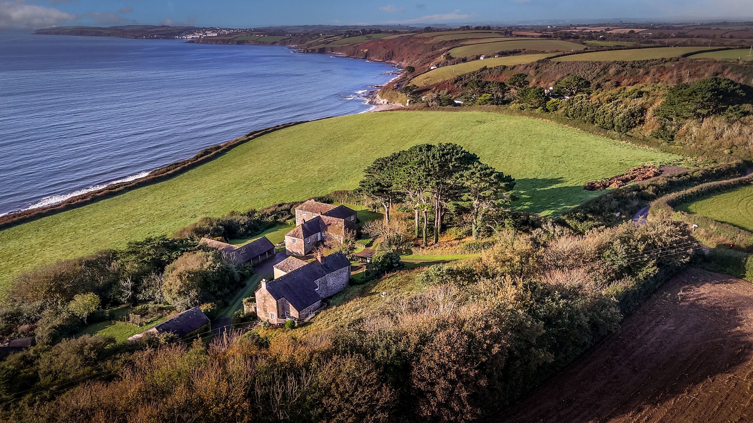 The Gwendra cottages (Gwendra Wartha, Gwendra Granary, Gwendra Dairy Cottage, Mowhay and Hayloft) overlooking the sea, Cornwall