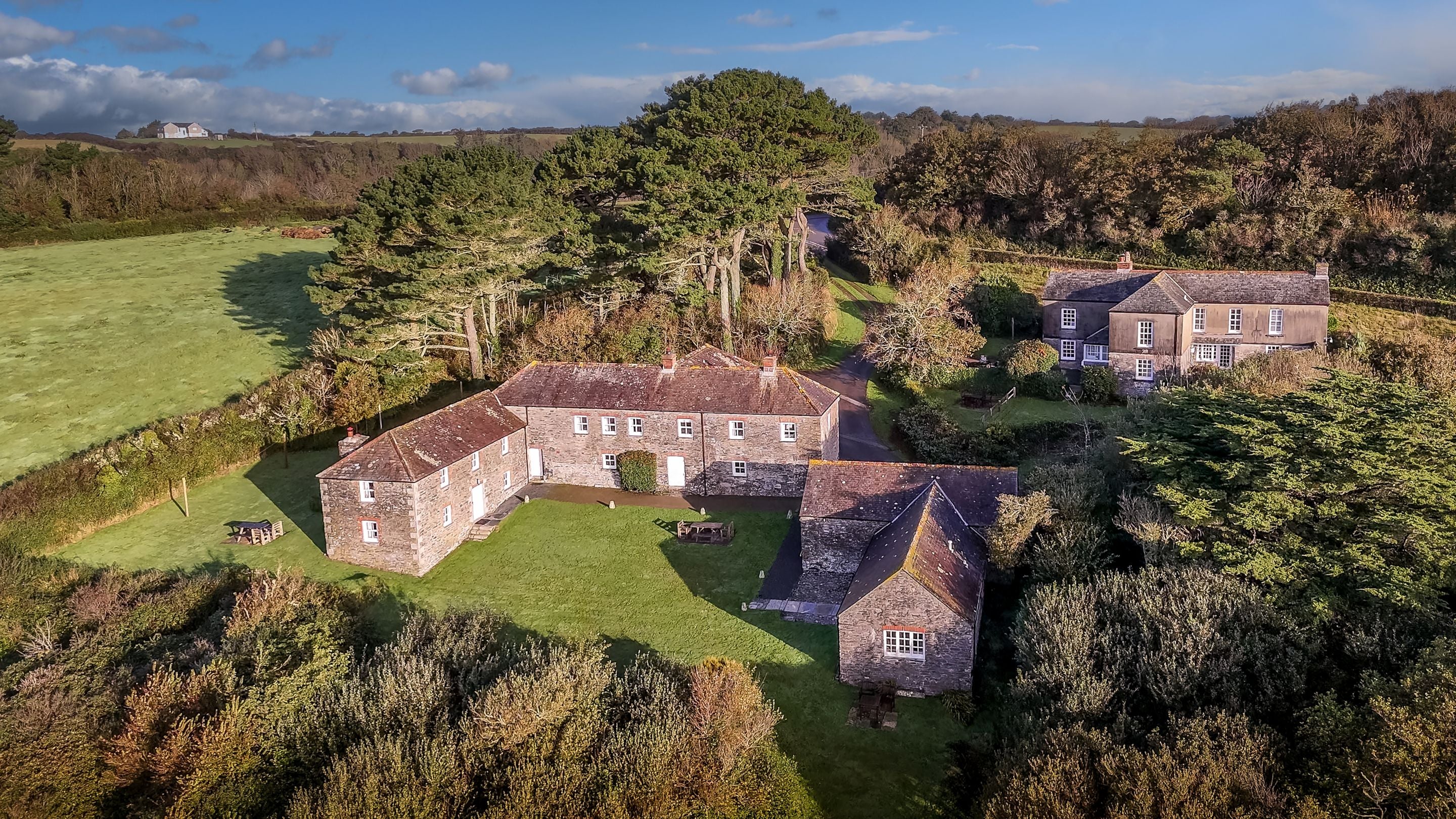 An aerial view of the Gwendra cottages, Gwendra Wartha, Gwendra Granary, Gwendra Dairy Cottage, Mowhay and Hayloft, Cornwall