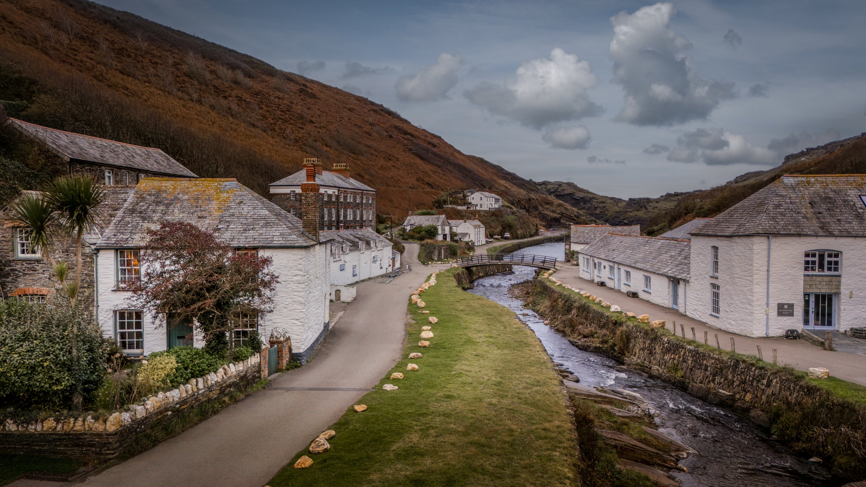 An aerial view of Harbour View (on the left) and the River Valency passing through Boscastle village, Cornwall