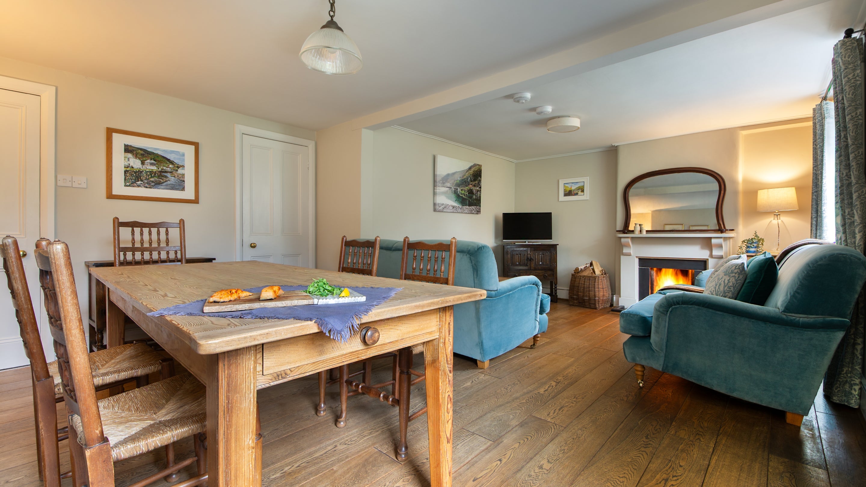 The open-plan sitting and dining room at Harbour View, Cornwall
