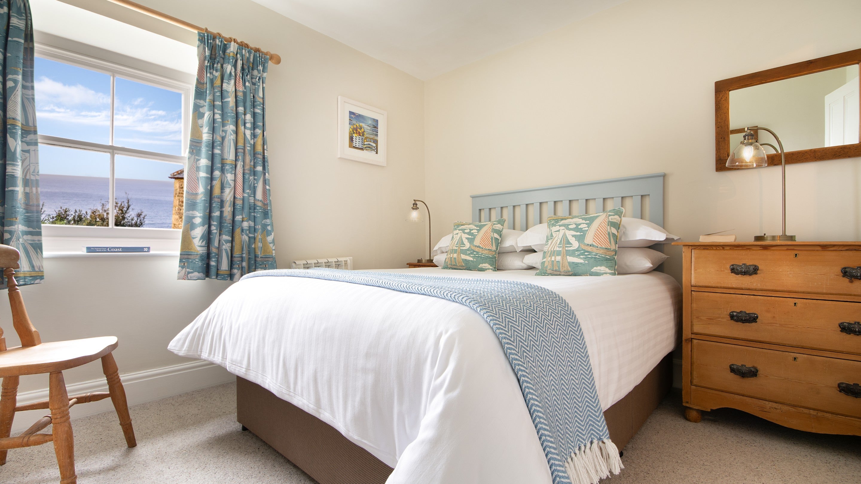 The double bedroom, with sea views, at Hayloft, Cornwall