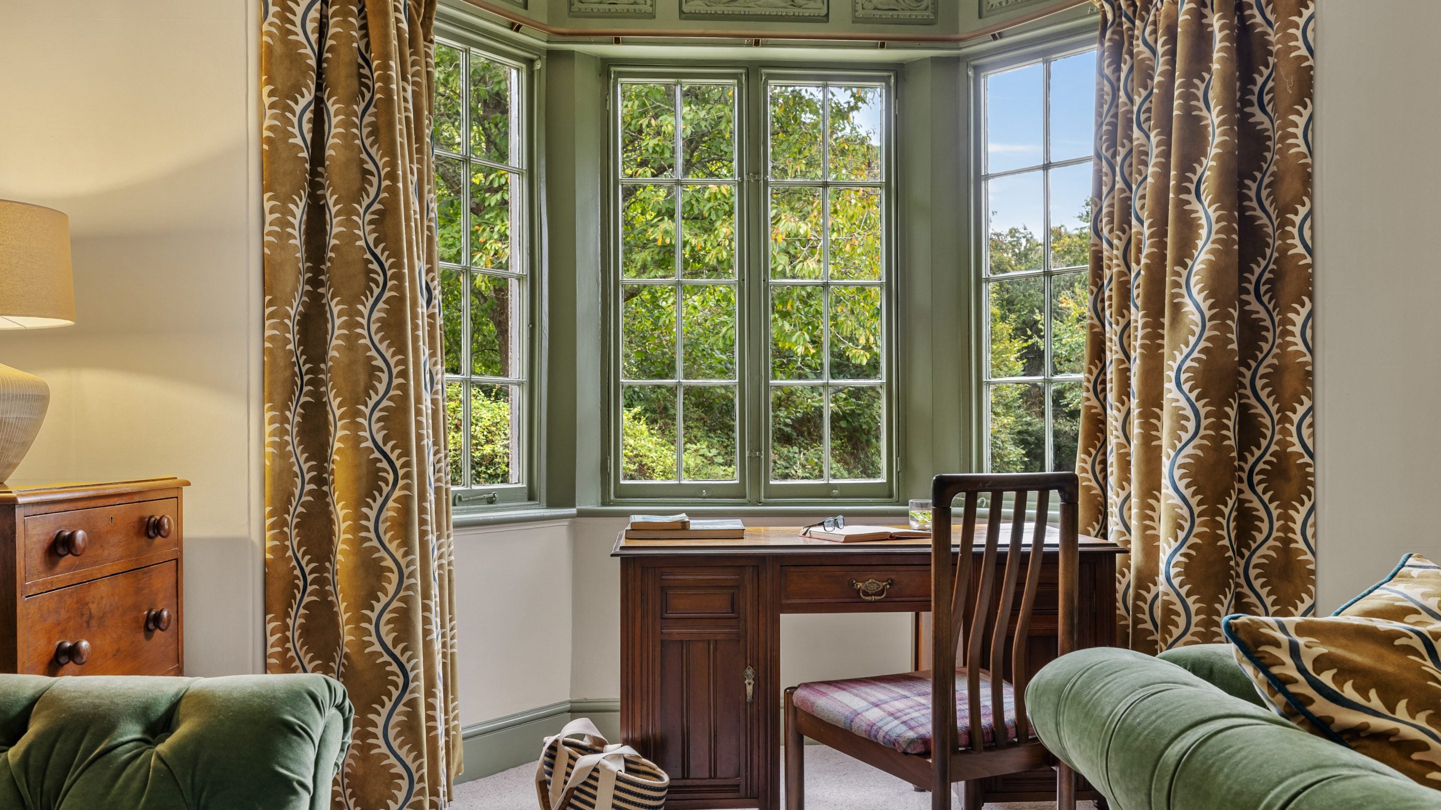 The desk in the window of the sitting room at Helston Lodge, Cornwall