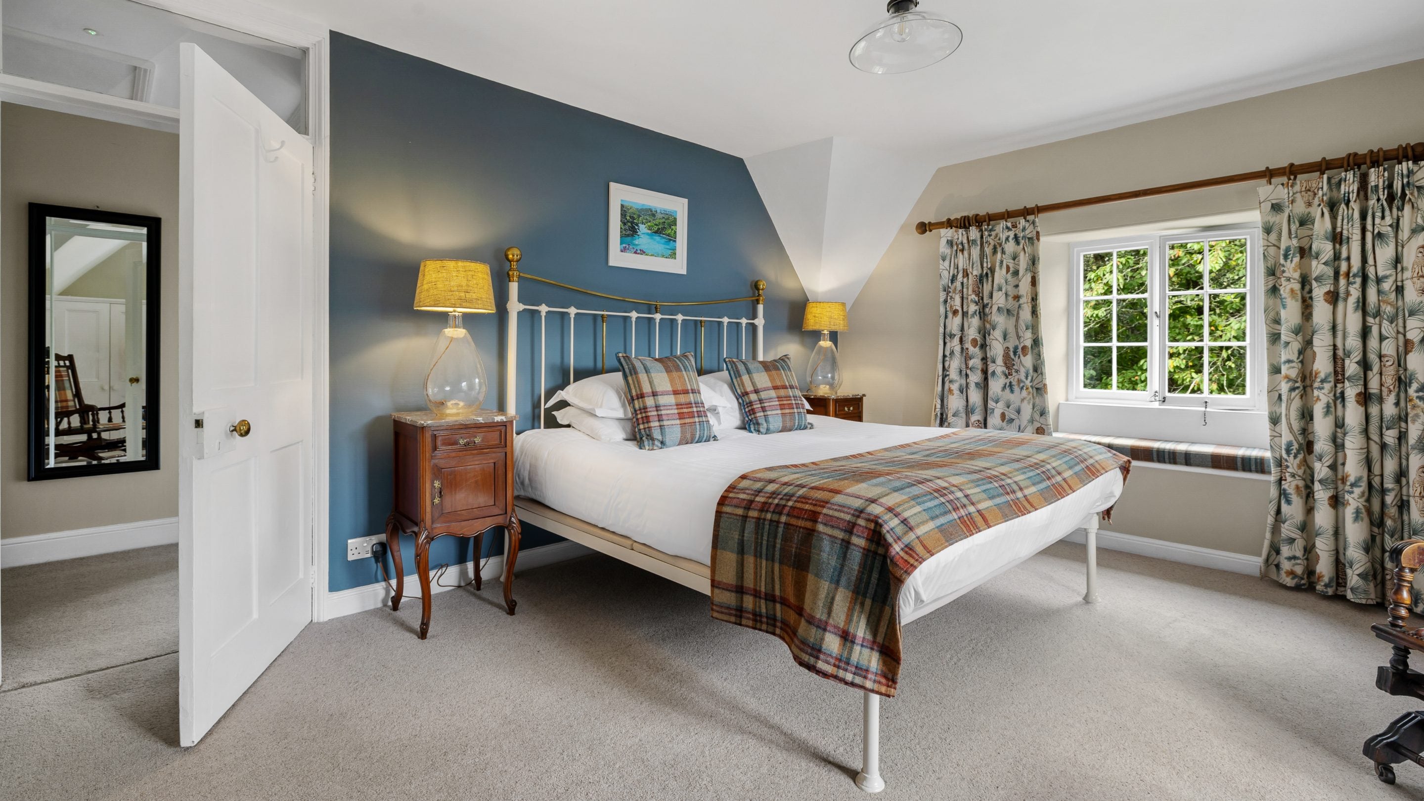 The super-king bedroom at Helston Lodge, Cornwall