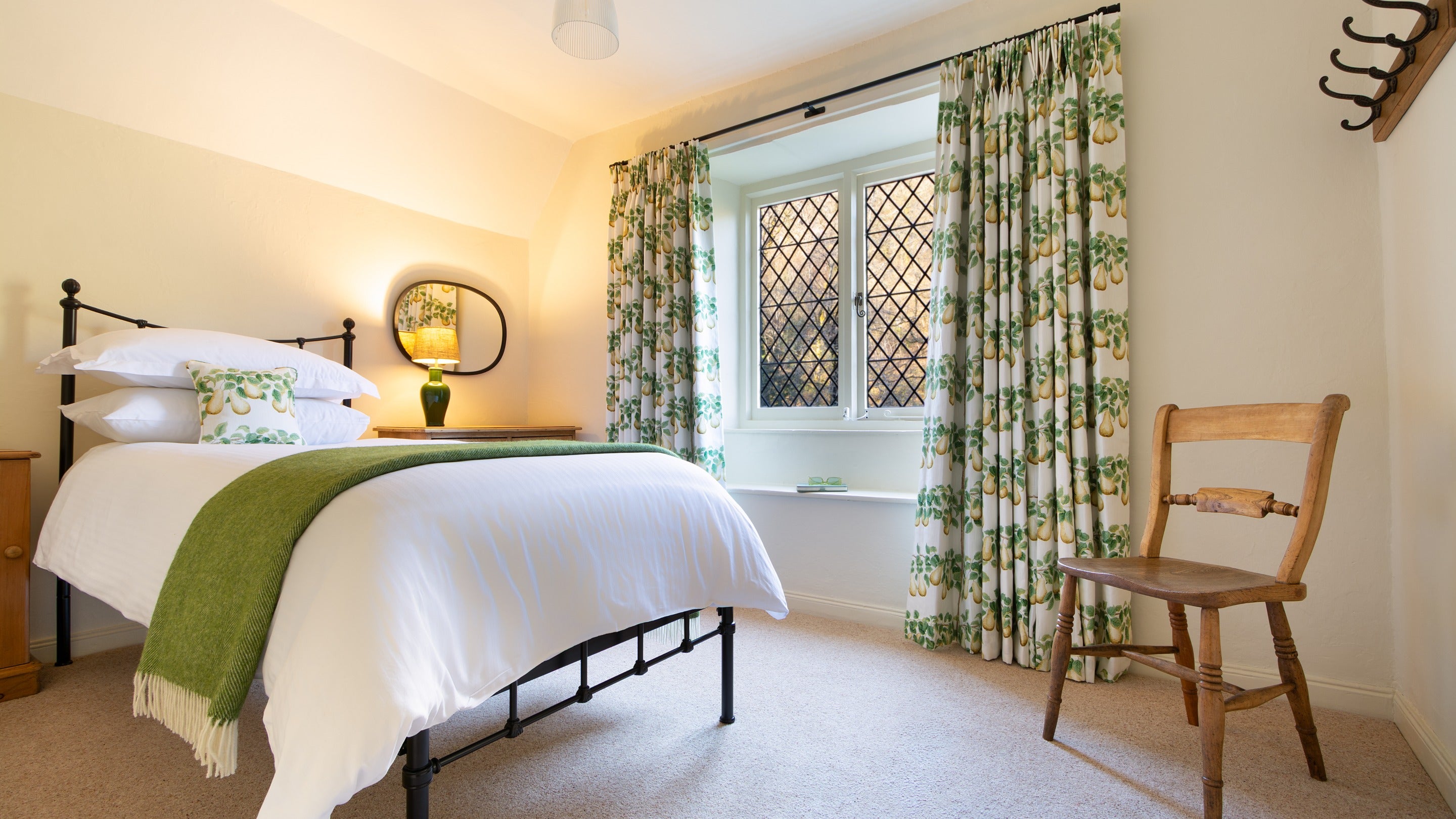 One of the single bedrooms, with a window seat, at Miller's House, Cornwall