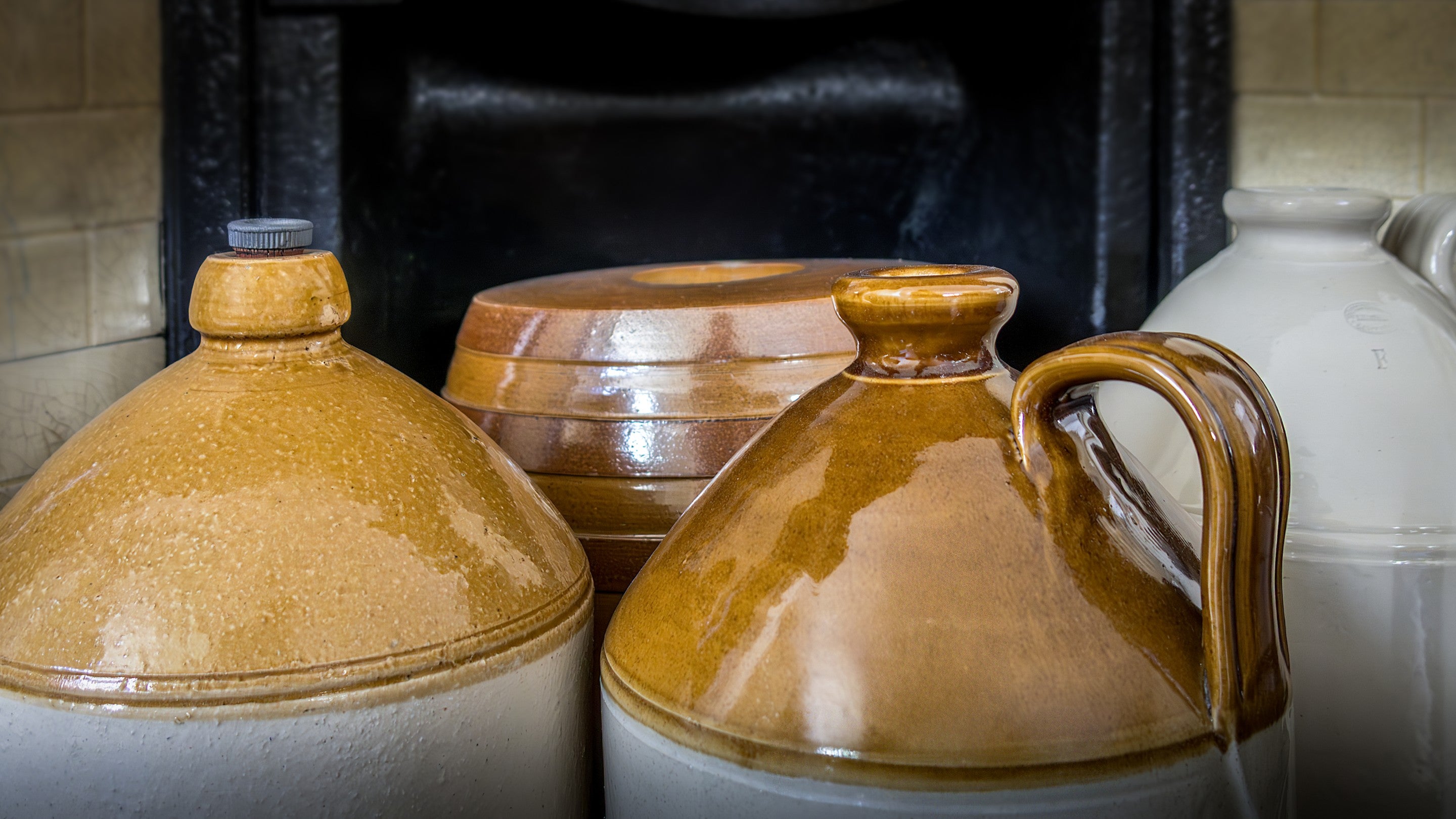 Stone bottles in the dining room at Miller's House, Cornwall