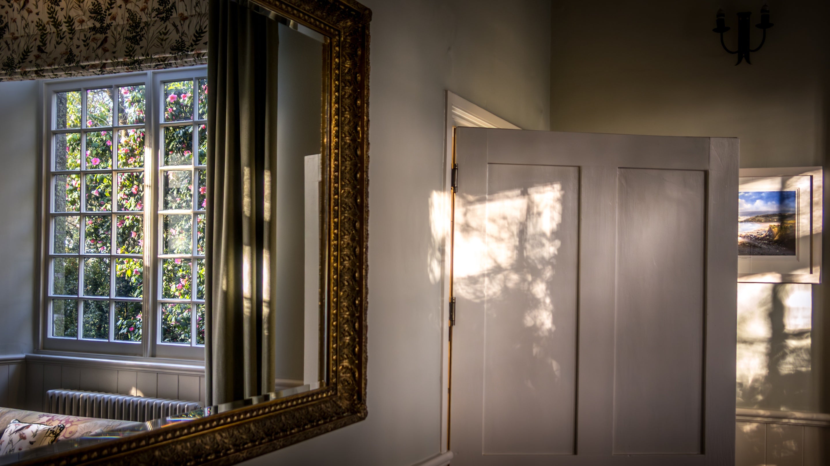 The mirror in the sitting room at Nanceglos House, Cornwall