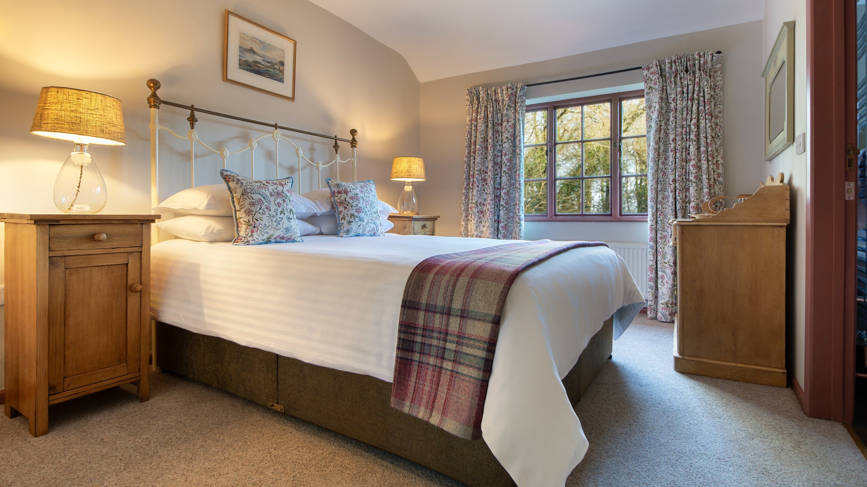 The double bedroom with en-suite bathroom at Nanceglos House, Cornwall