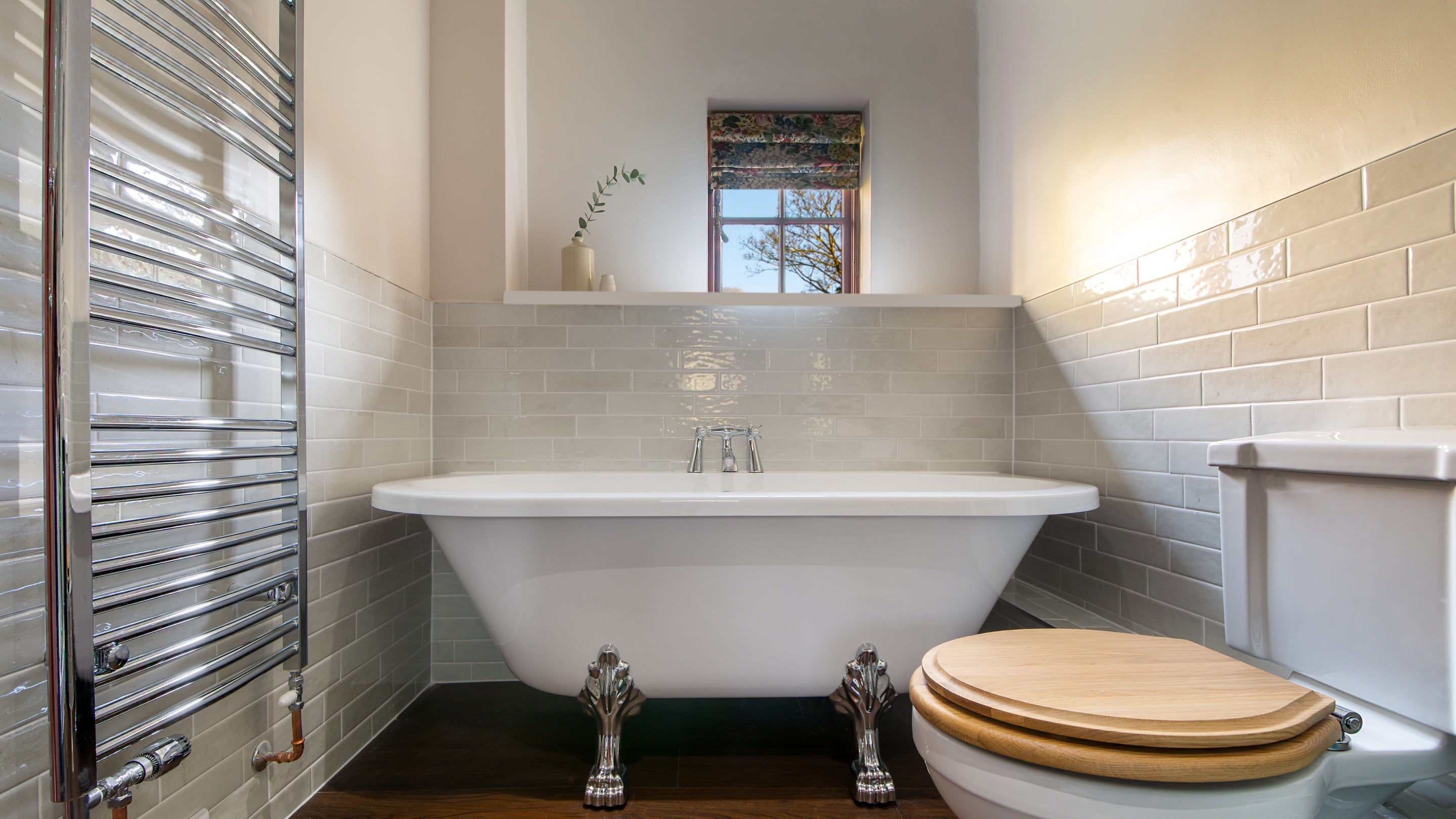 The roll-top bath in the en-suite bathroom at Nanceglos House, Cornwall