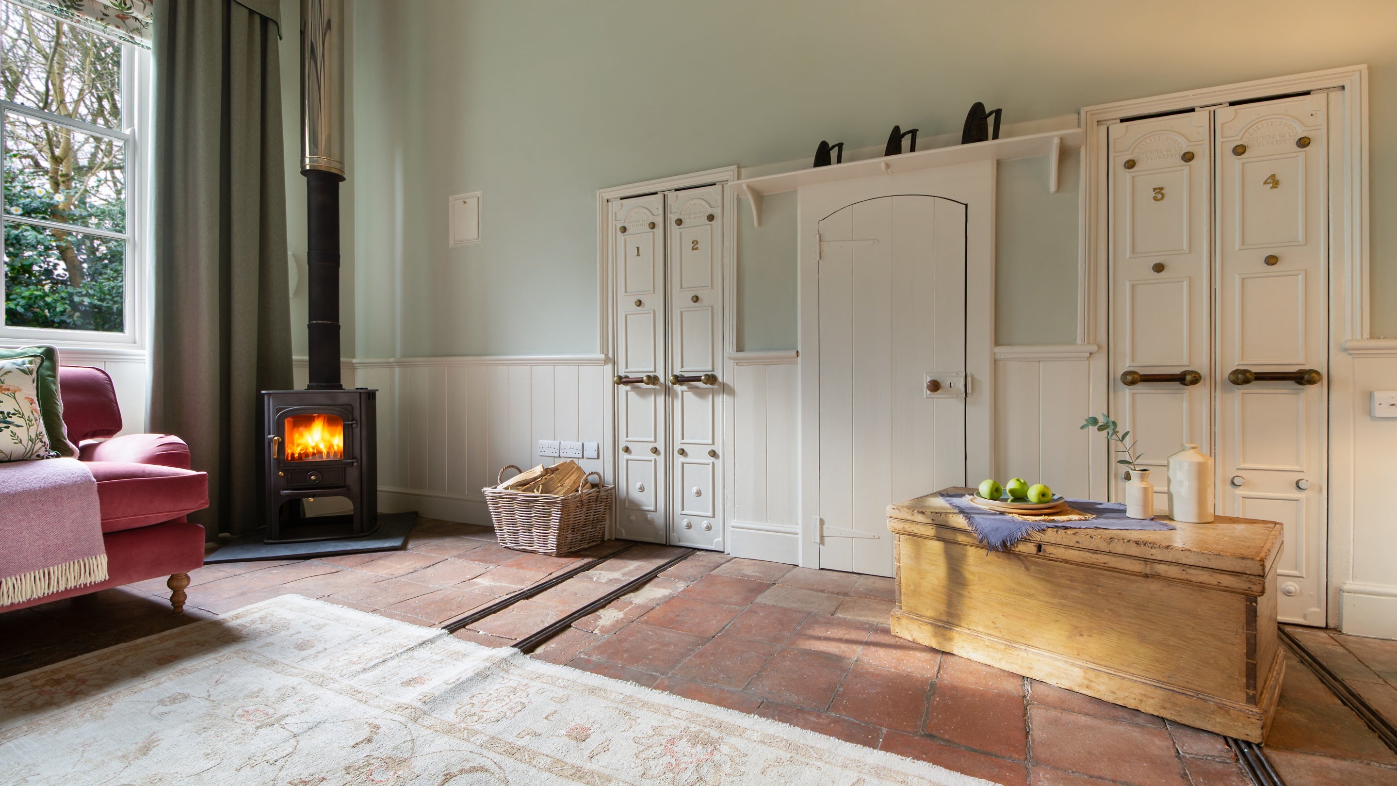 The sitting room at Nanceglos House, with original features from when the cottage was a laundry house, Cornwall
