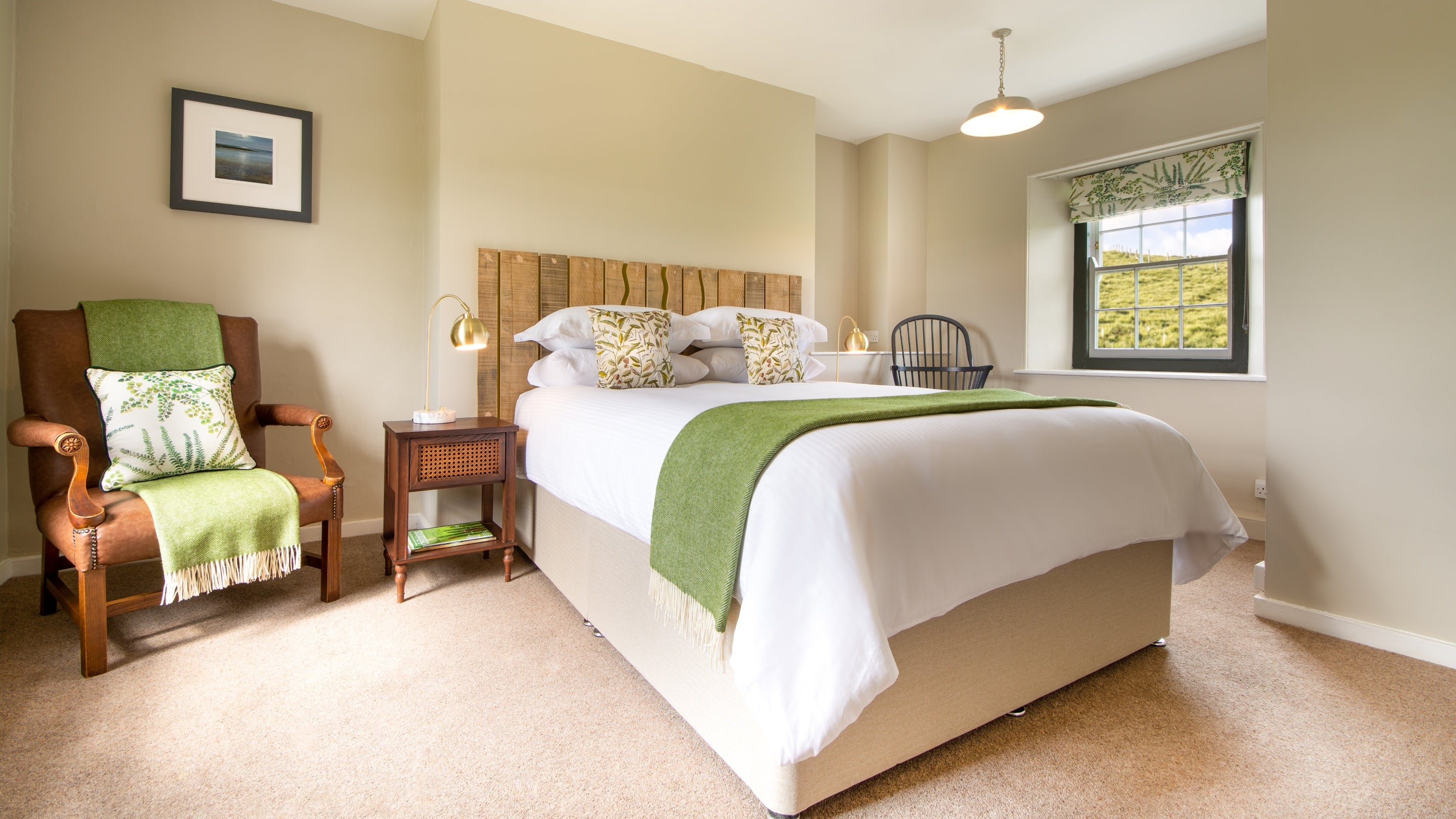 The bedroom with king sized bed at Pentireglaze East Cottage, Cornwall