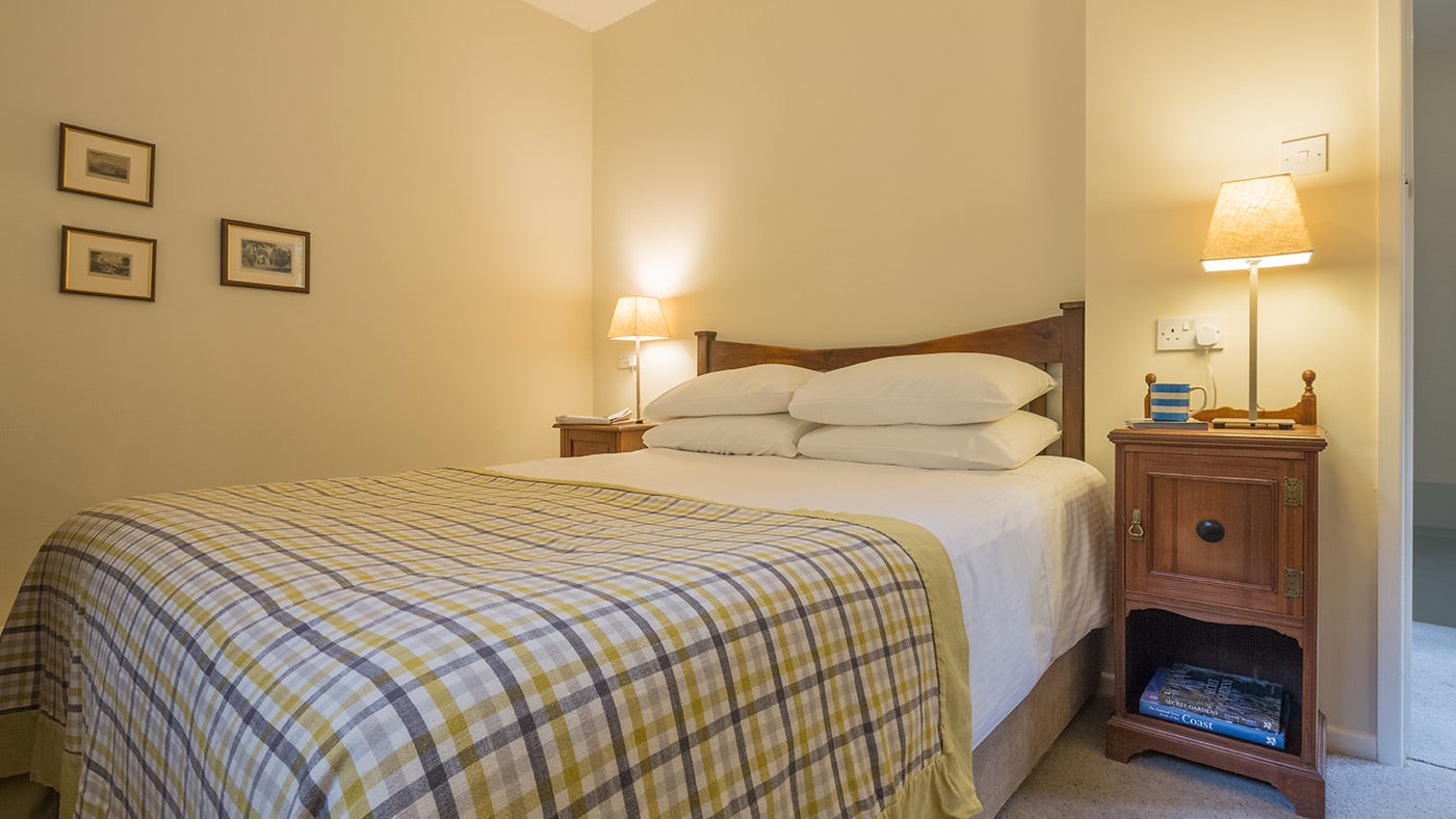 The double bedroom at Pont Creek Cottage, Pont Pill, Cornwall