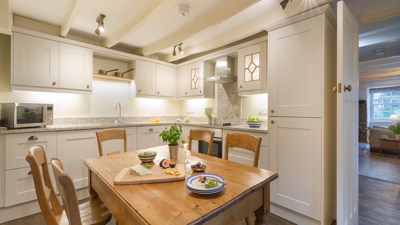 The kitchen and dining area at Pont Pill Farm House, Pont Pill, Cornwall