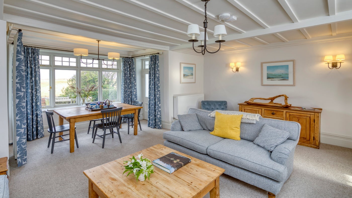The sitting and dining room at Porth Mear Cottage, near Padstow, Cornwall 