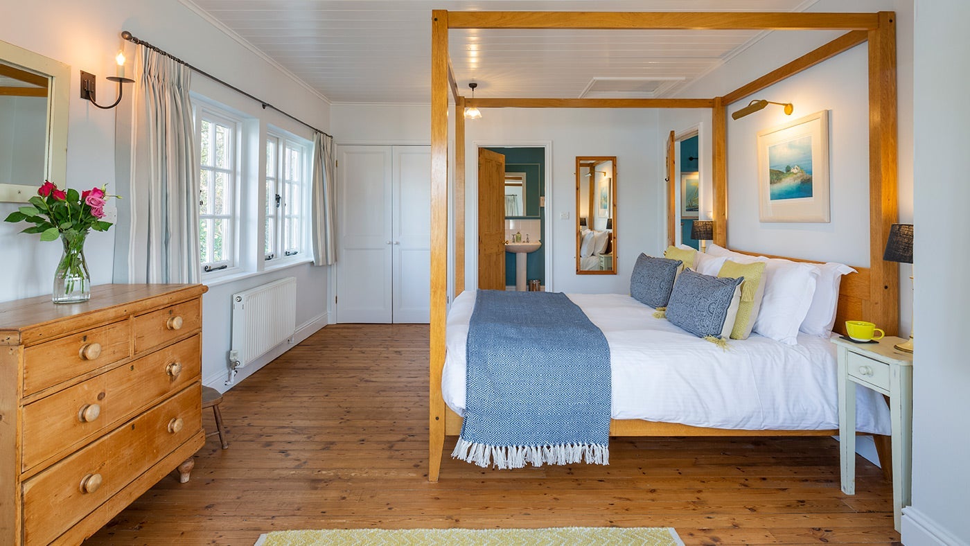 The double bedroom at Powders, with built-in wardrobe and en-suite bathroom, Cornwall