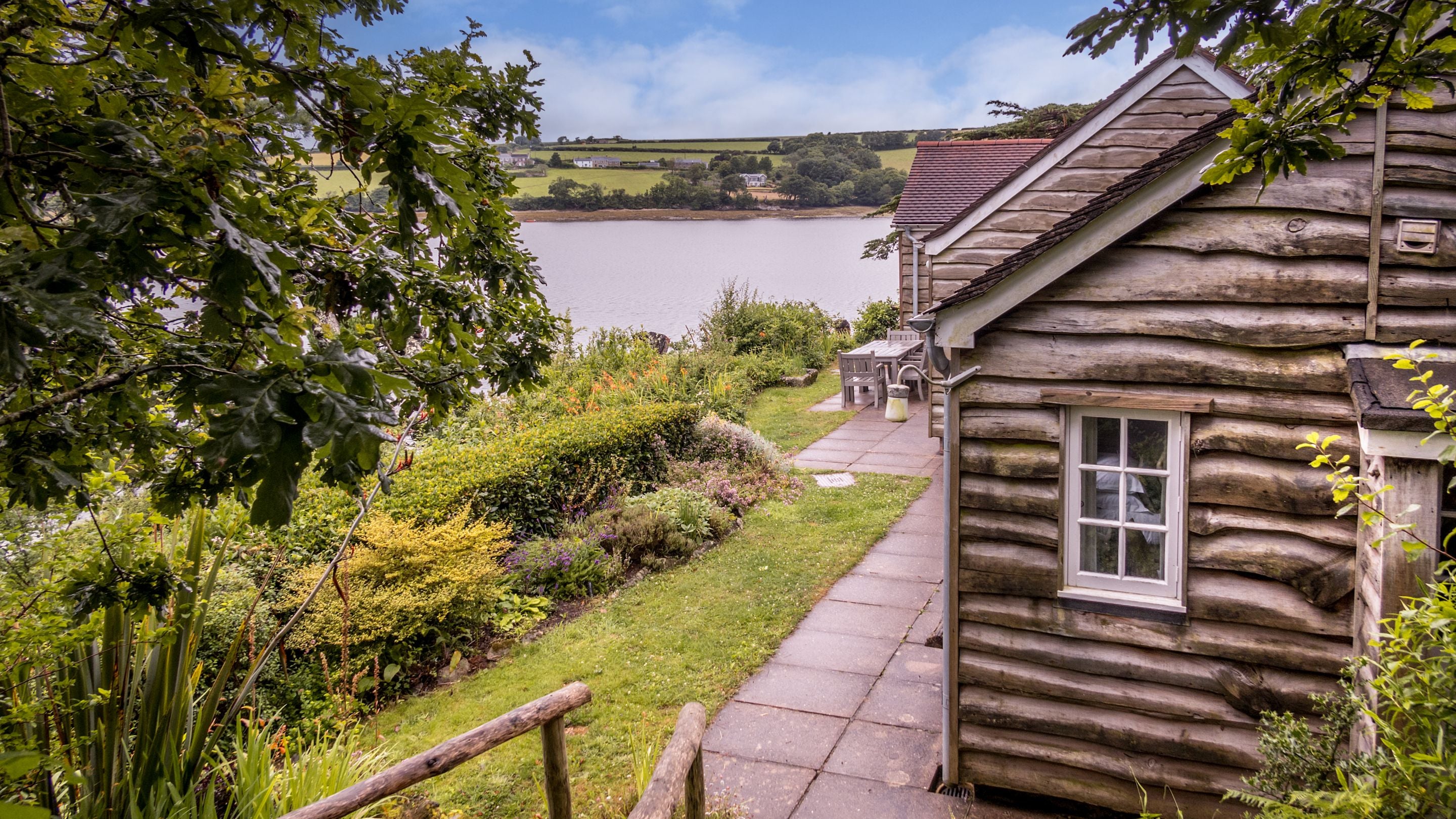 A view of the exterior of Powders, from the steps down to the cabin, Cornwall