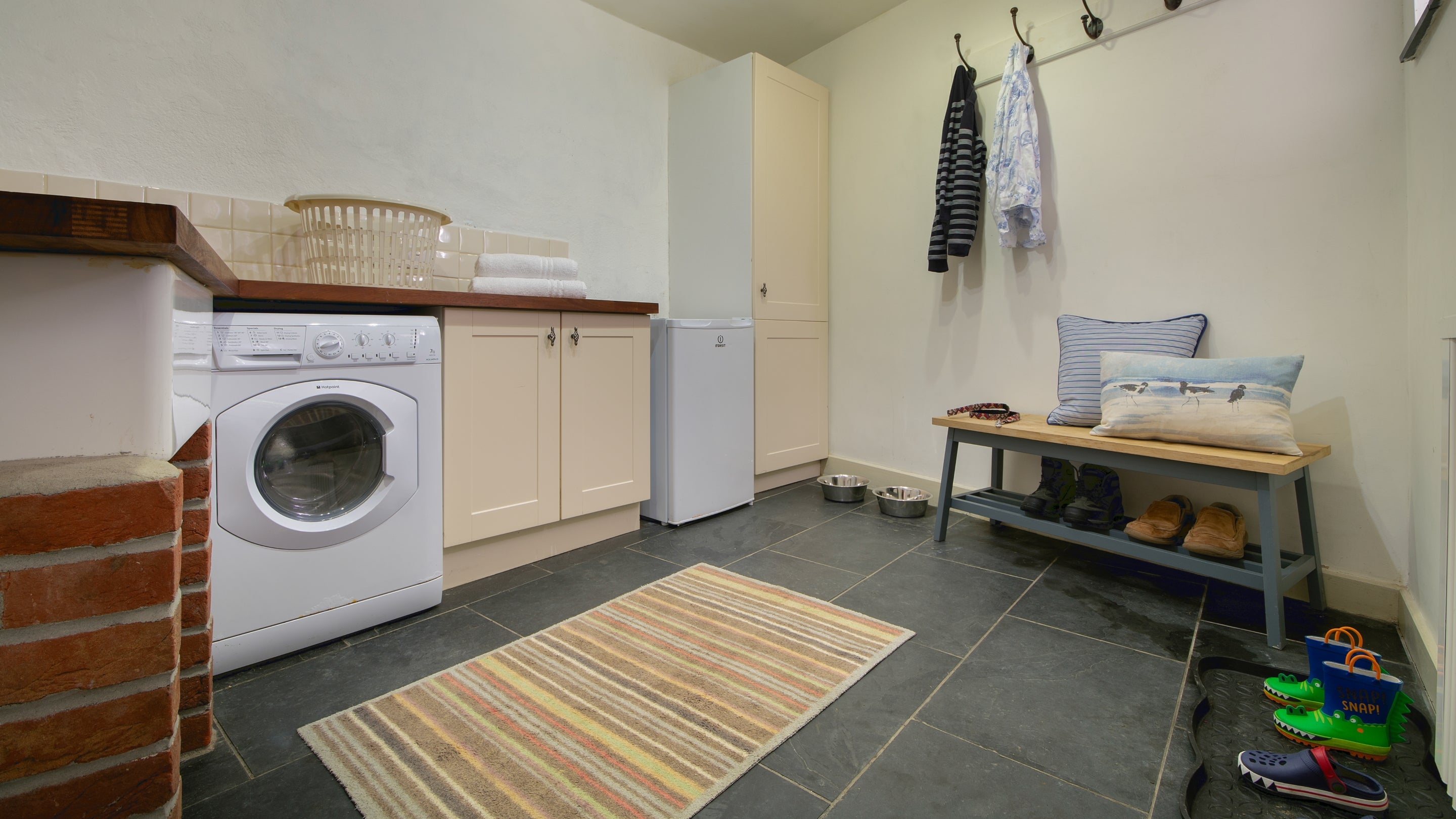 The utility and boot room at Quin Cottage, Cornwall