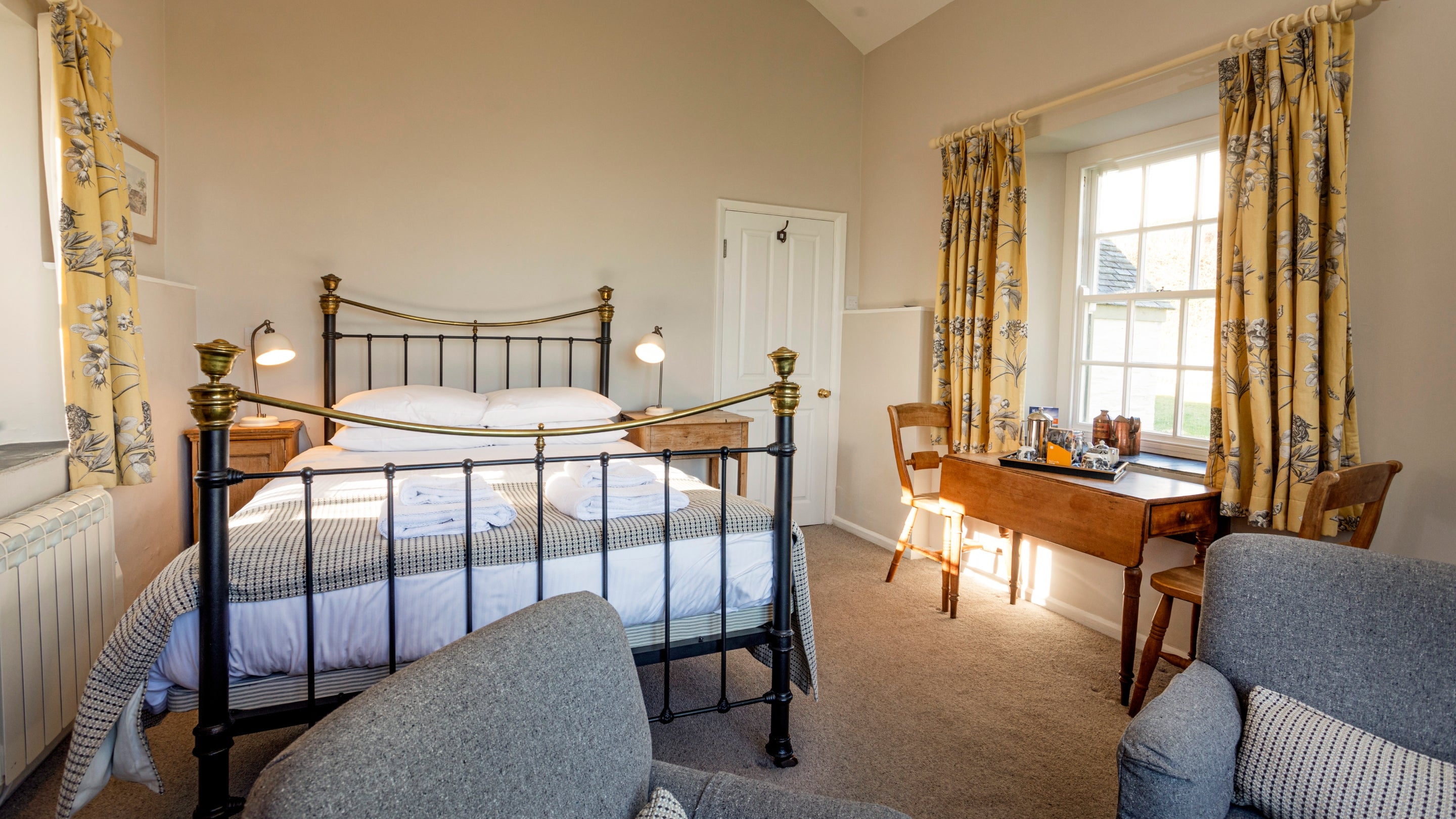 The living area and bedroom at Roseland Old School House, Cornwall