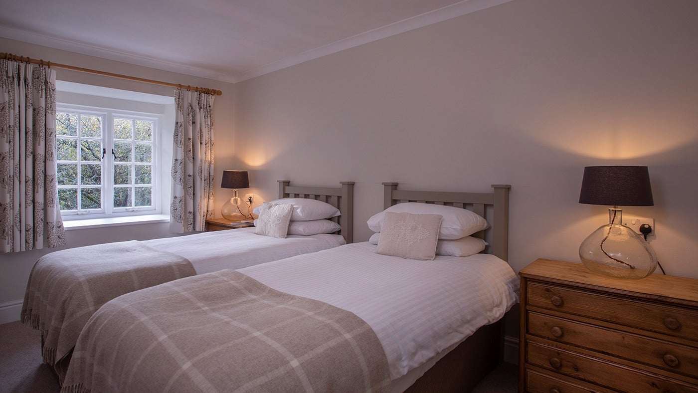 The first twin bedroom at Roseland Porth Barn, Cornwall