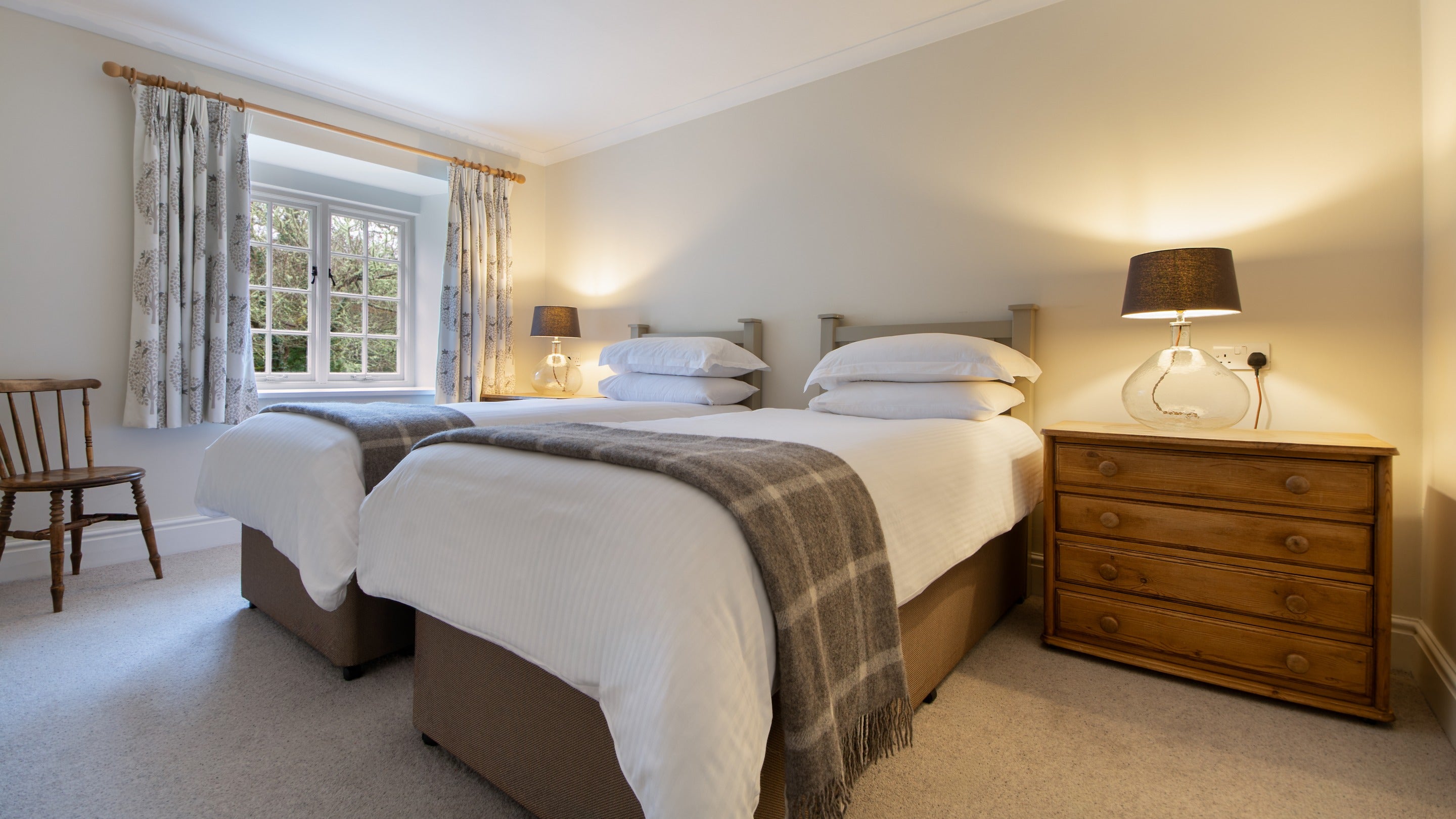 One of the twin bedrooms at Roseland Porth Barn, Cornwall