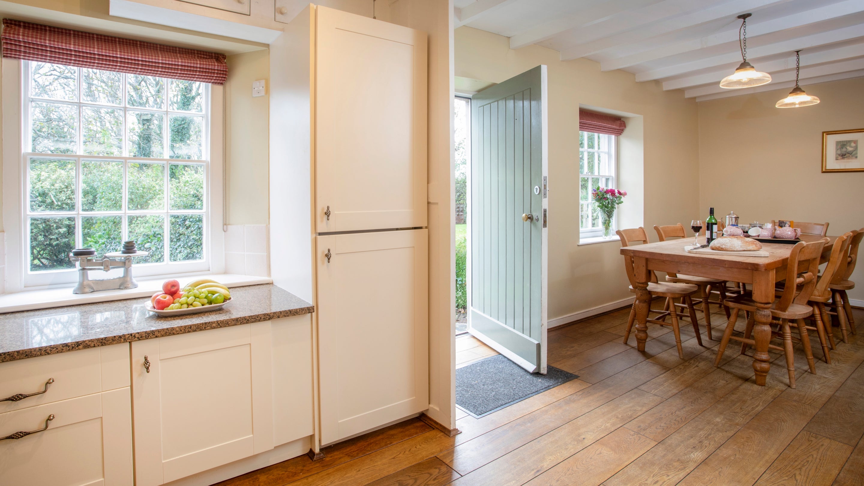 The kitchen and dining room at Roseland Porth Farm House, Cornwall