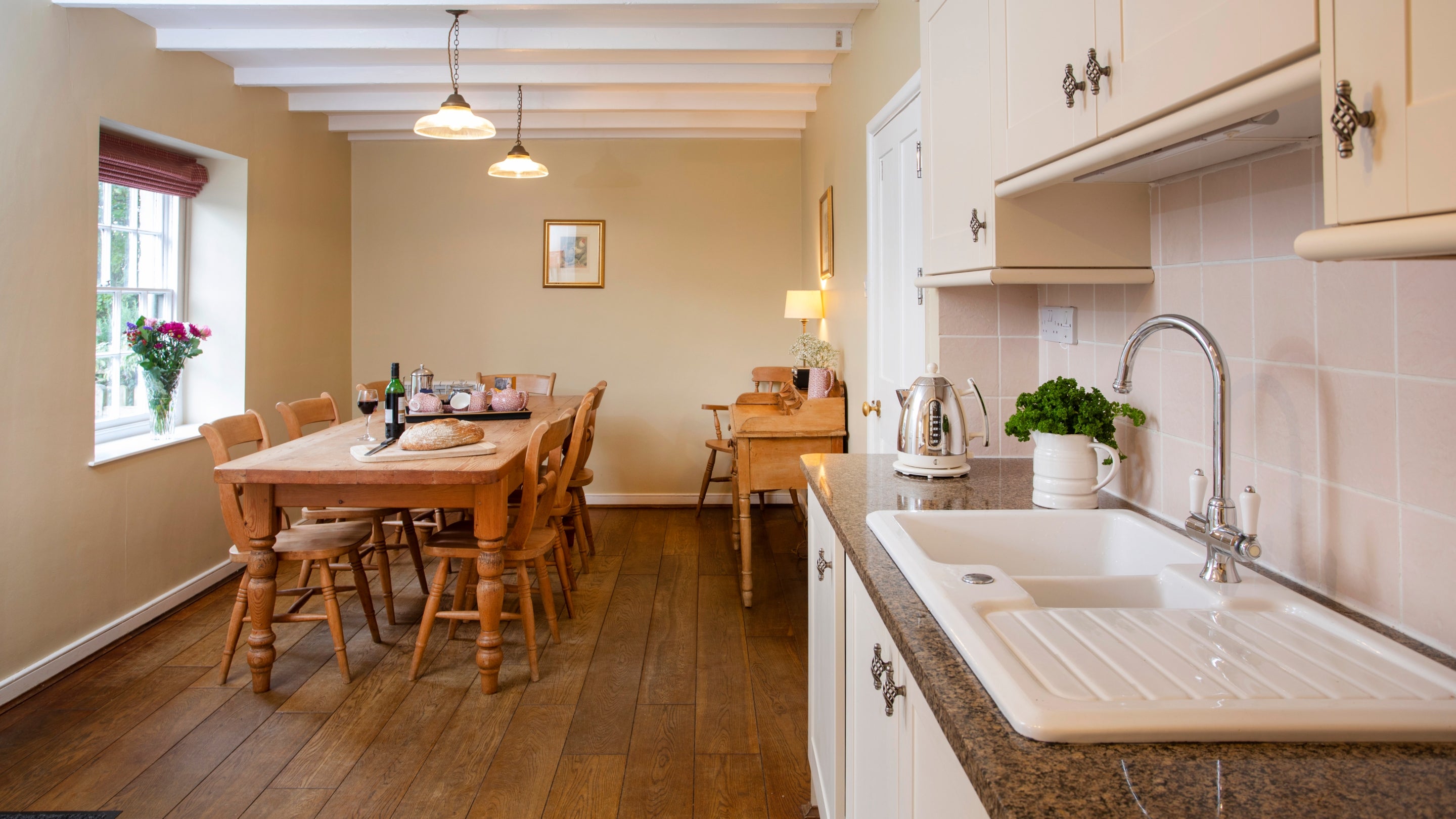 The kitchen and dining room at Roseland Porth Farm House, Cornwall