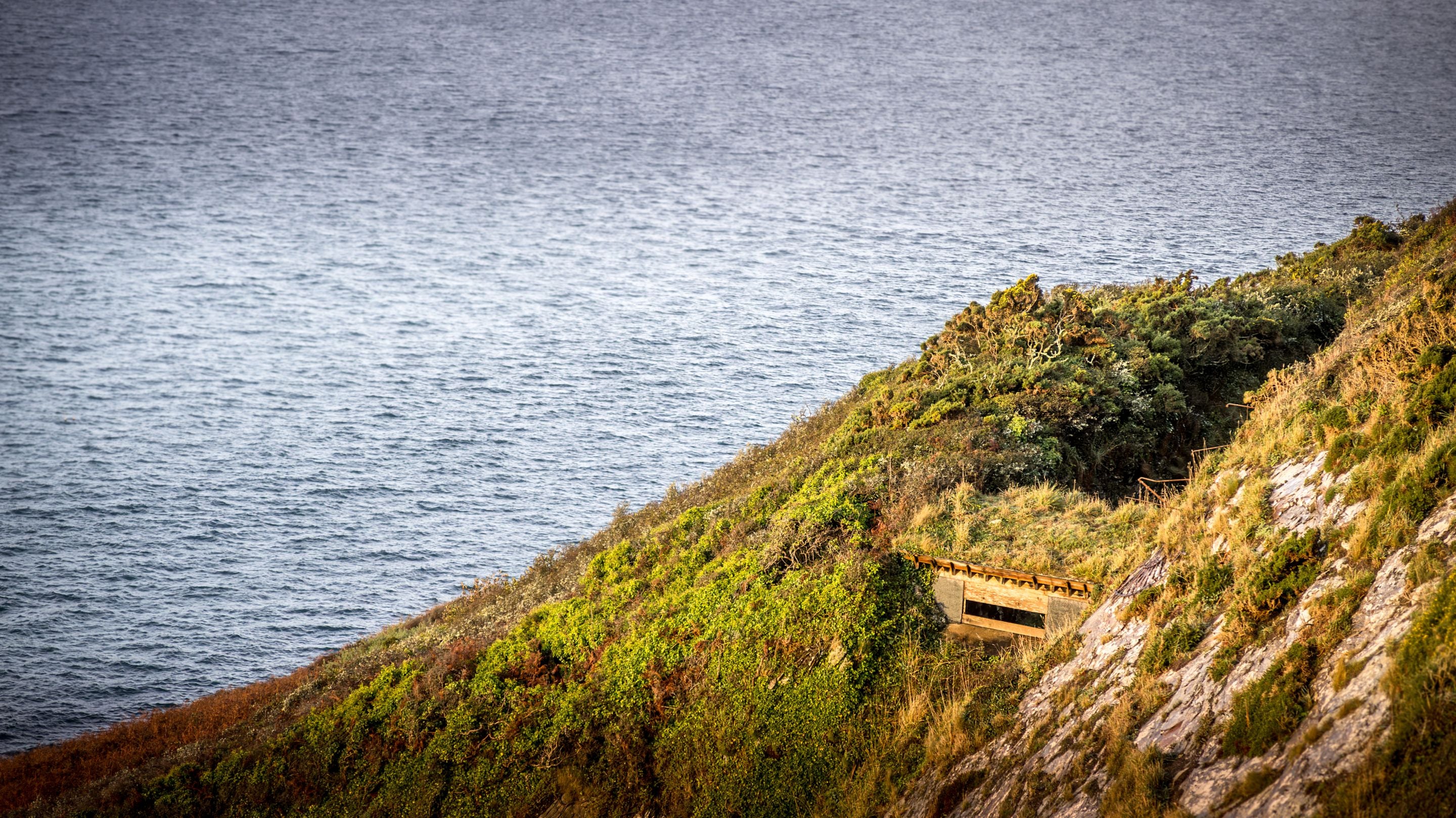 The bird hide near the holiday cottages on St Anthony Head, Cornwall