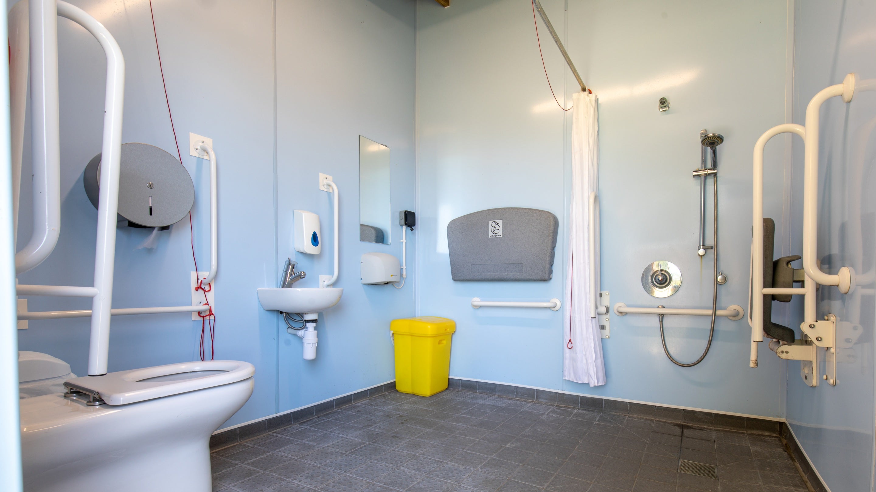 The accessible toilet and shower room with baby-changing facilities at Teneriffe Farm Campsite, Cornwall