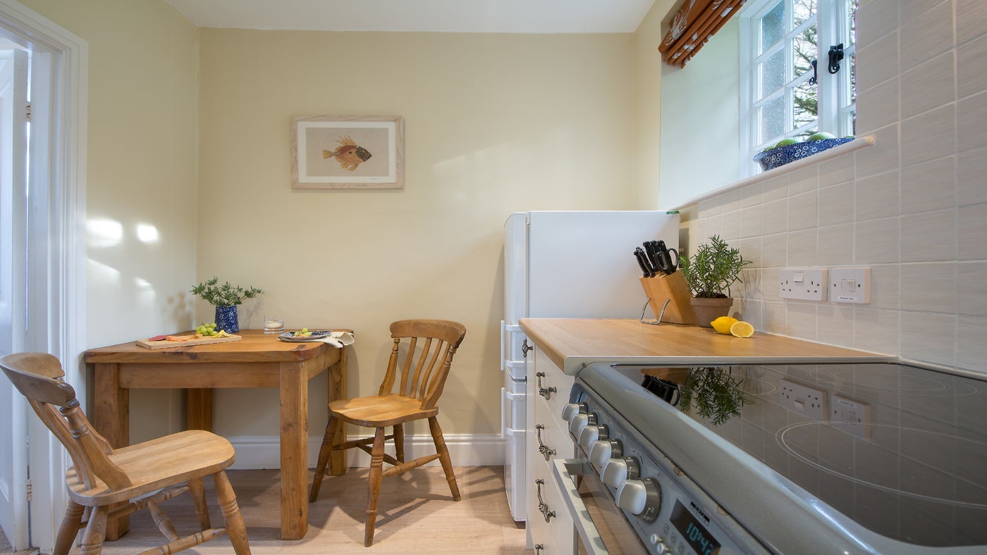 The kitchen and dining area at Tiffy's, St Anthony Head, Cornwall