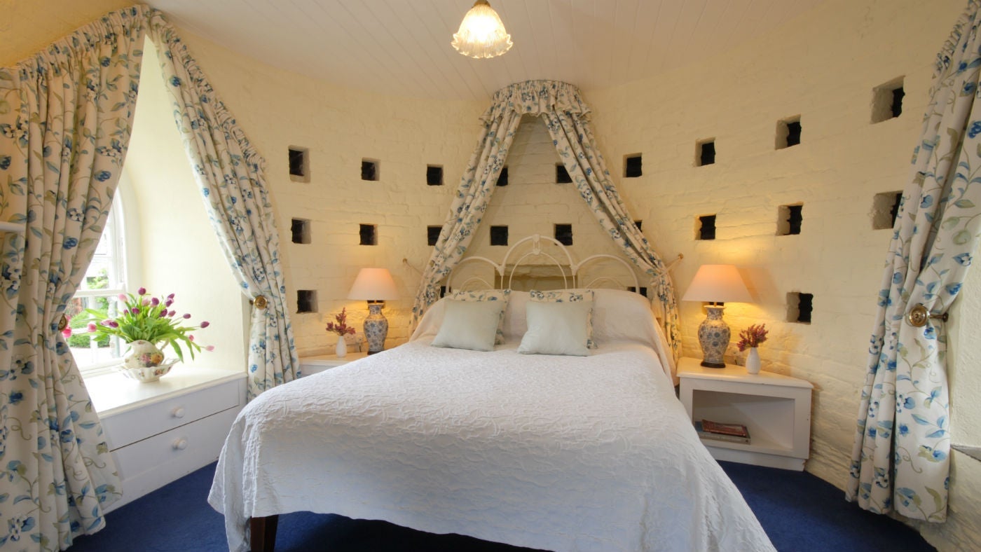 The bedroom at The Water Tower, Trelissick, Cornwall